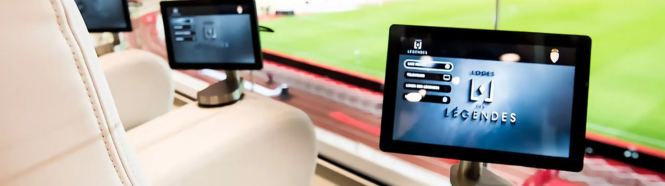 Weather-resistant outdoor digital signage display in a stadium for fan engagement.