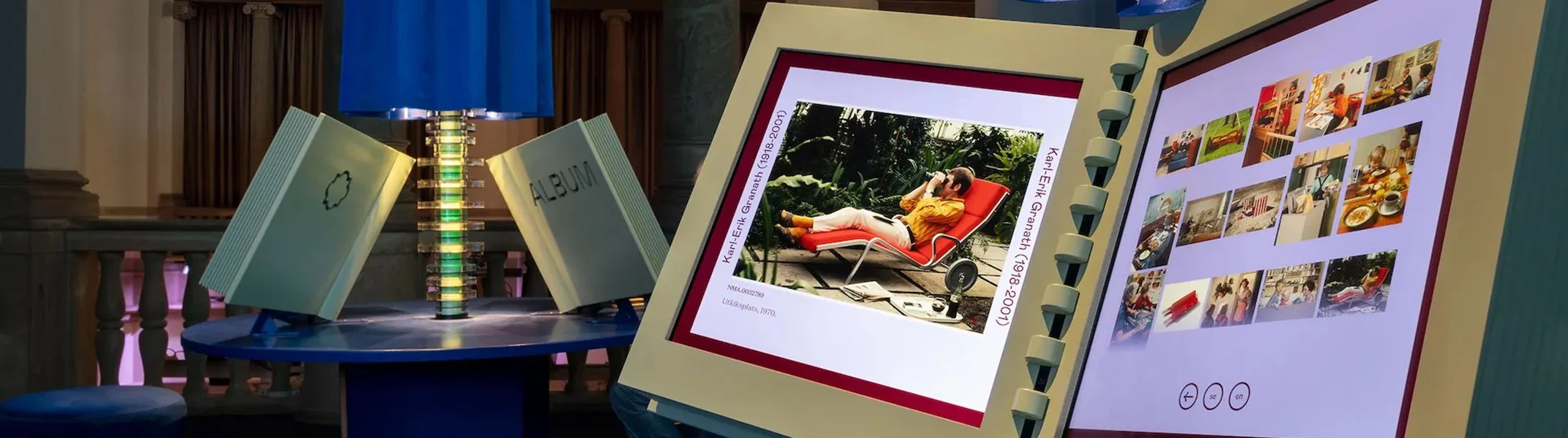 Square touchscreen digital signage display for immersive museum experiences.