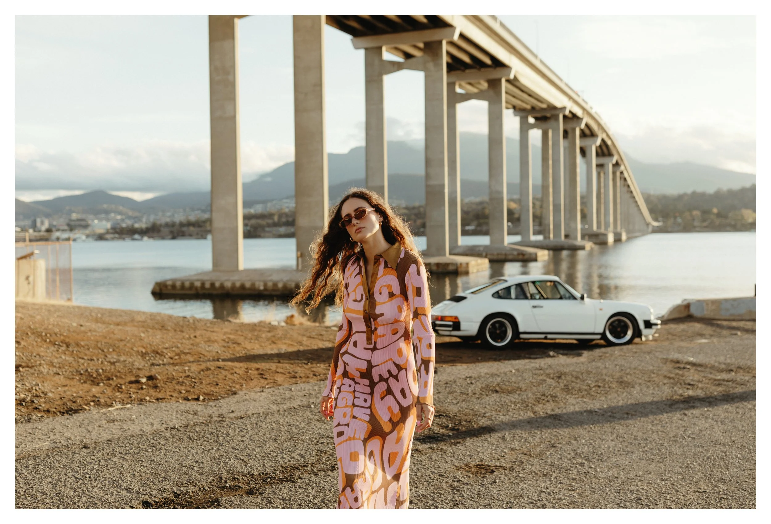 Model walks away from Derwent River in Arthur dress.