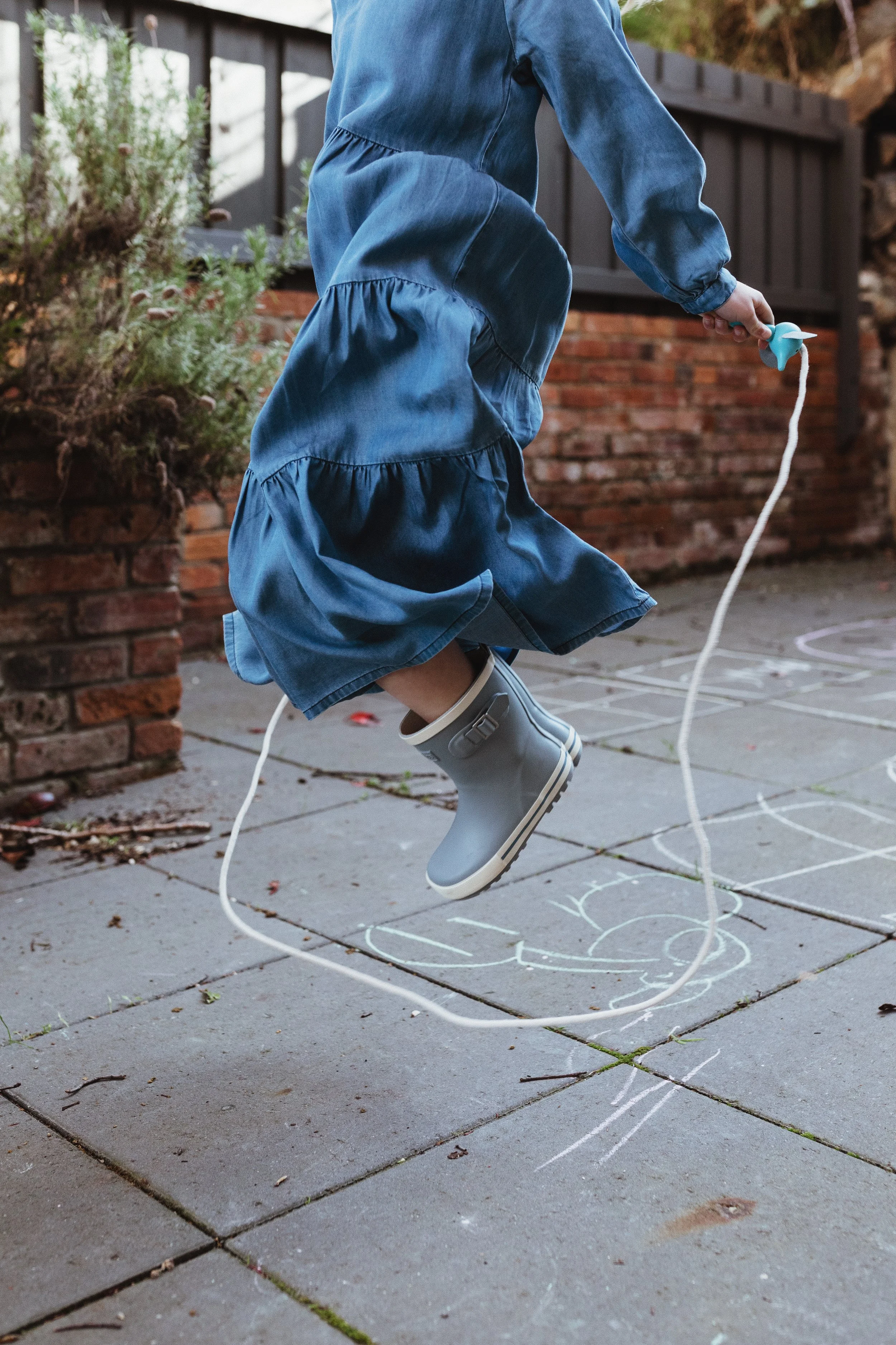 Girl jumps rope for kids commercial photography shoot in Hobart.