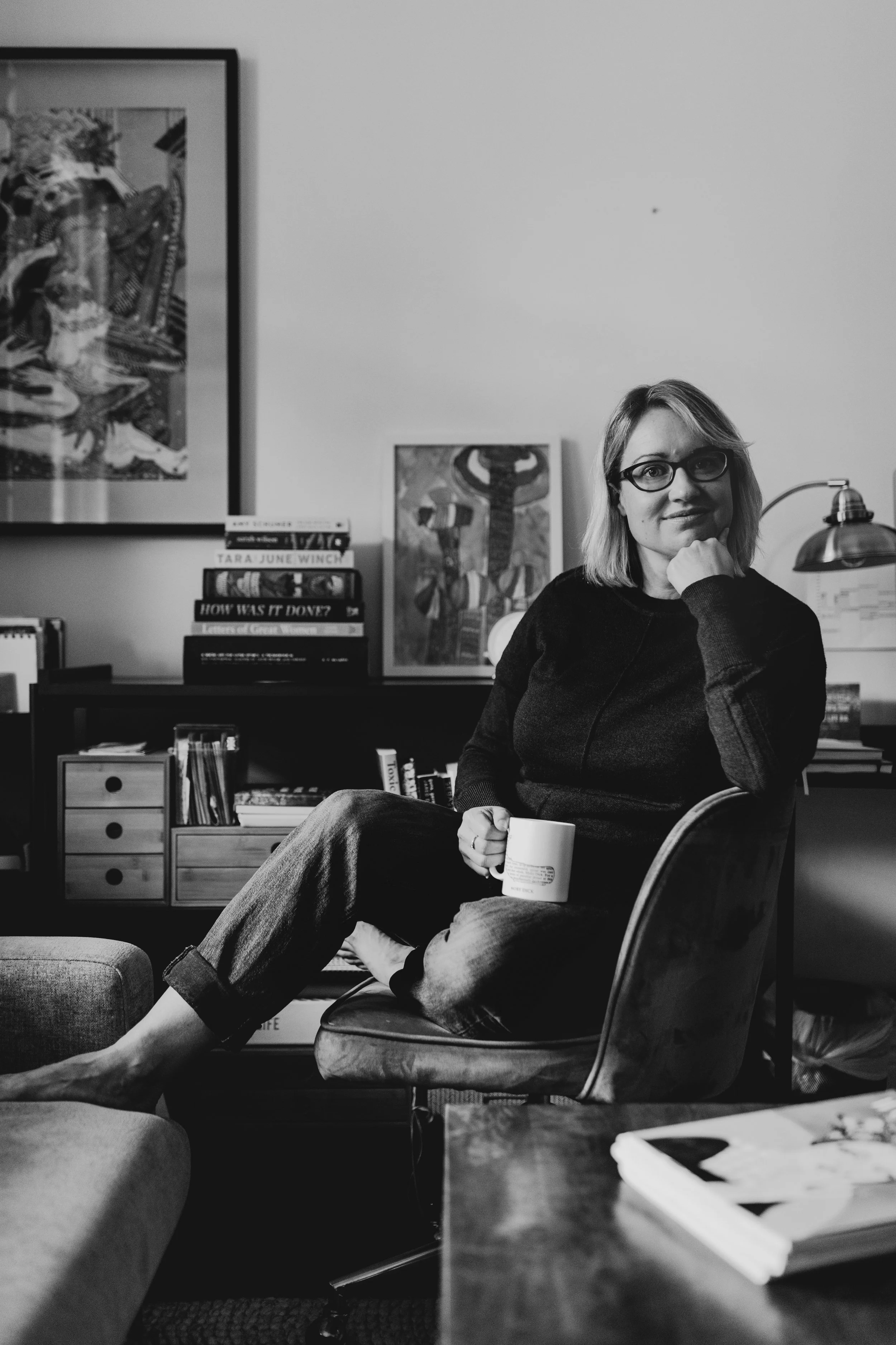 Writer poses naturally for bio photo.