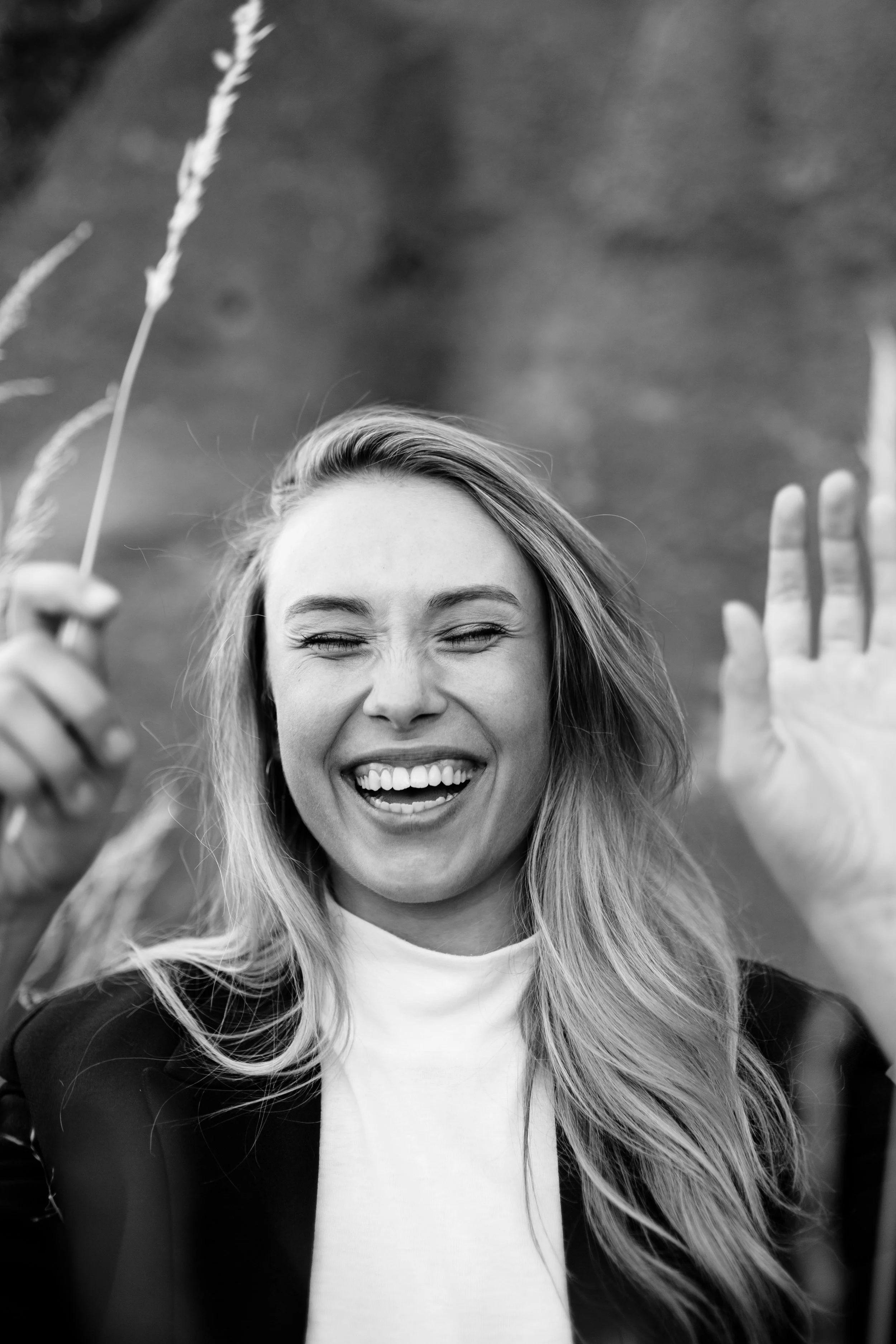 Fashion model laughing during test shoot in Hobart.