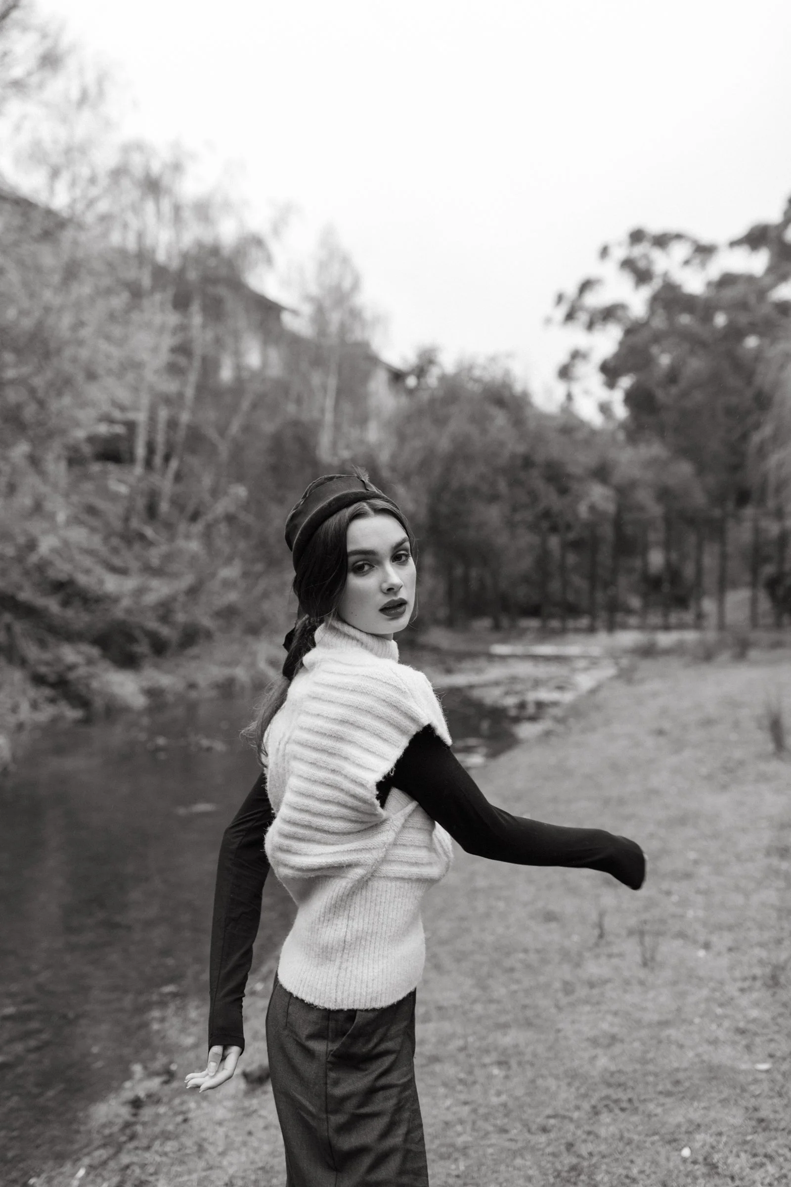 Model looks over shoulder during photo shoot in Tasmania.
