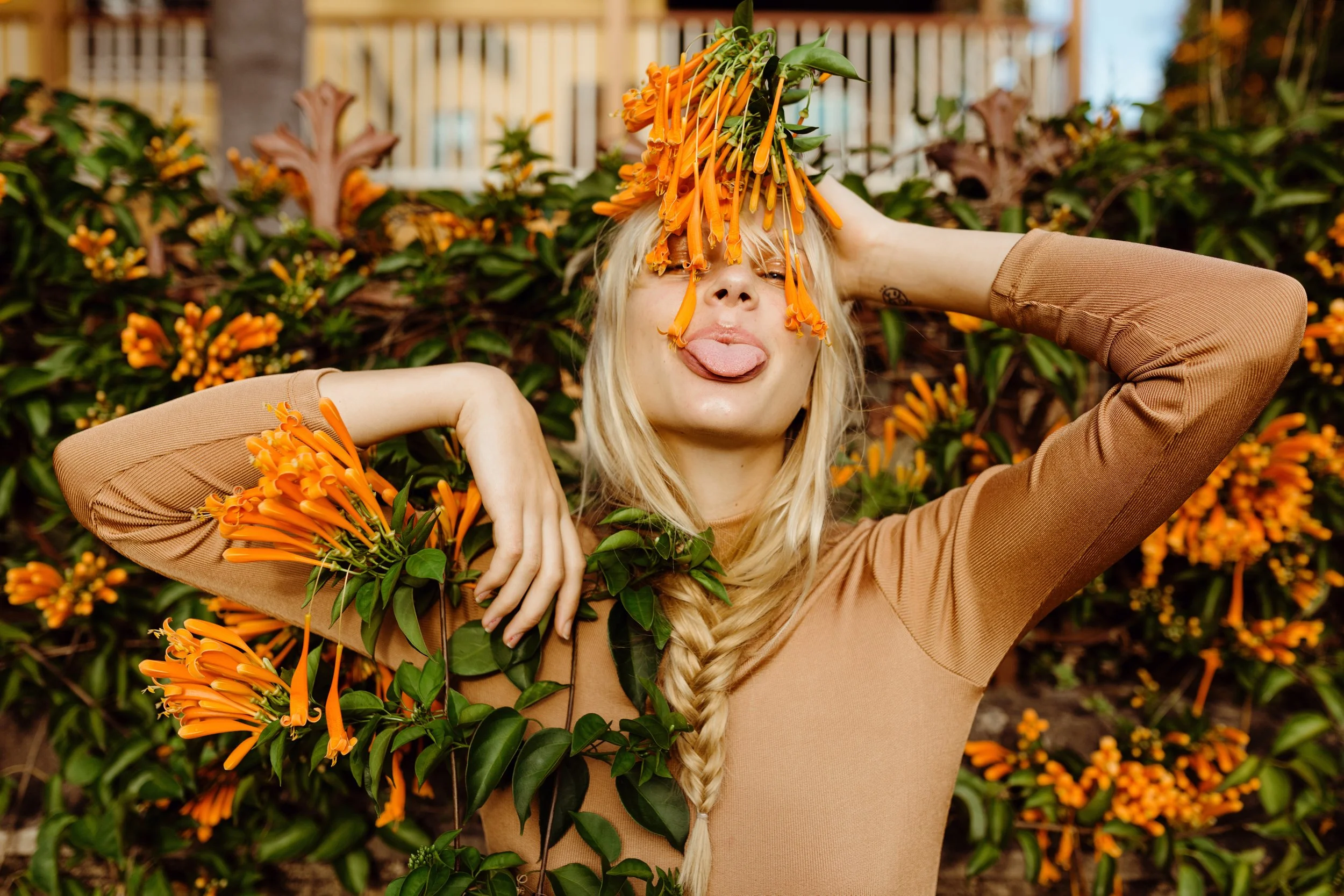 Model cheekily pokes her tongue out for fashion test shoot.