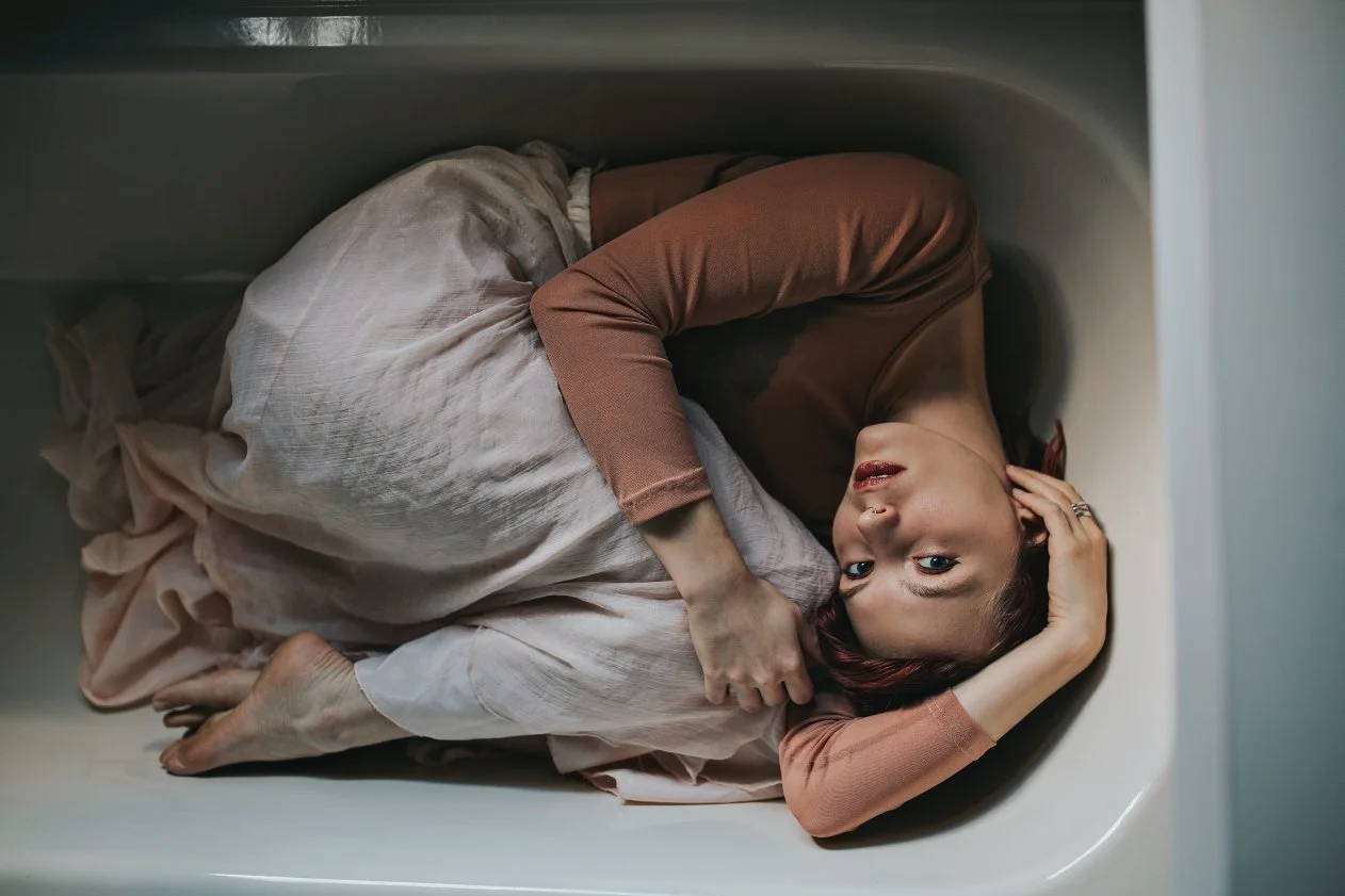 Model in bath looking up.