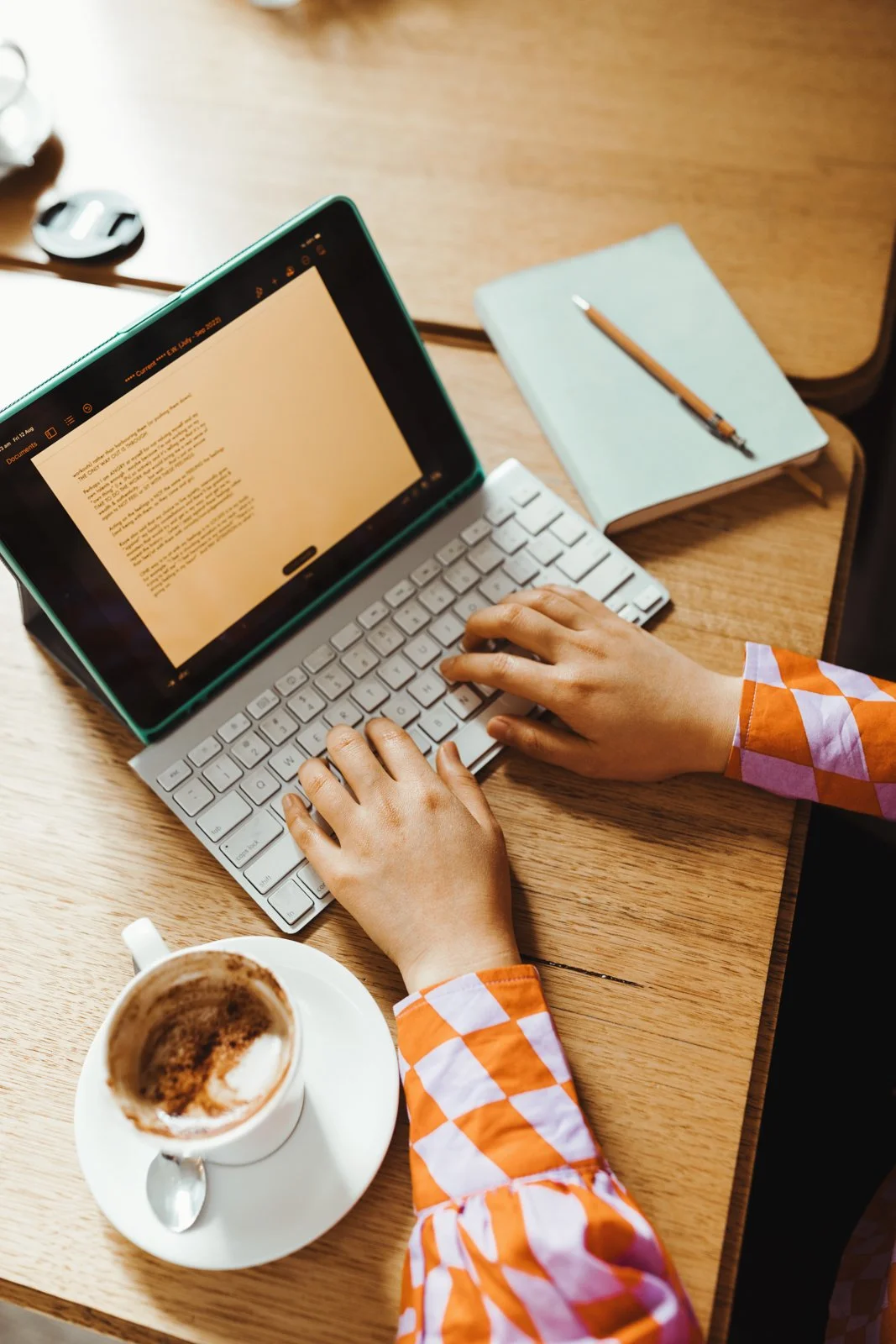Lifestyle branding photo of hands at a keyboard. 