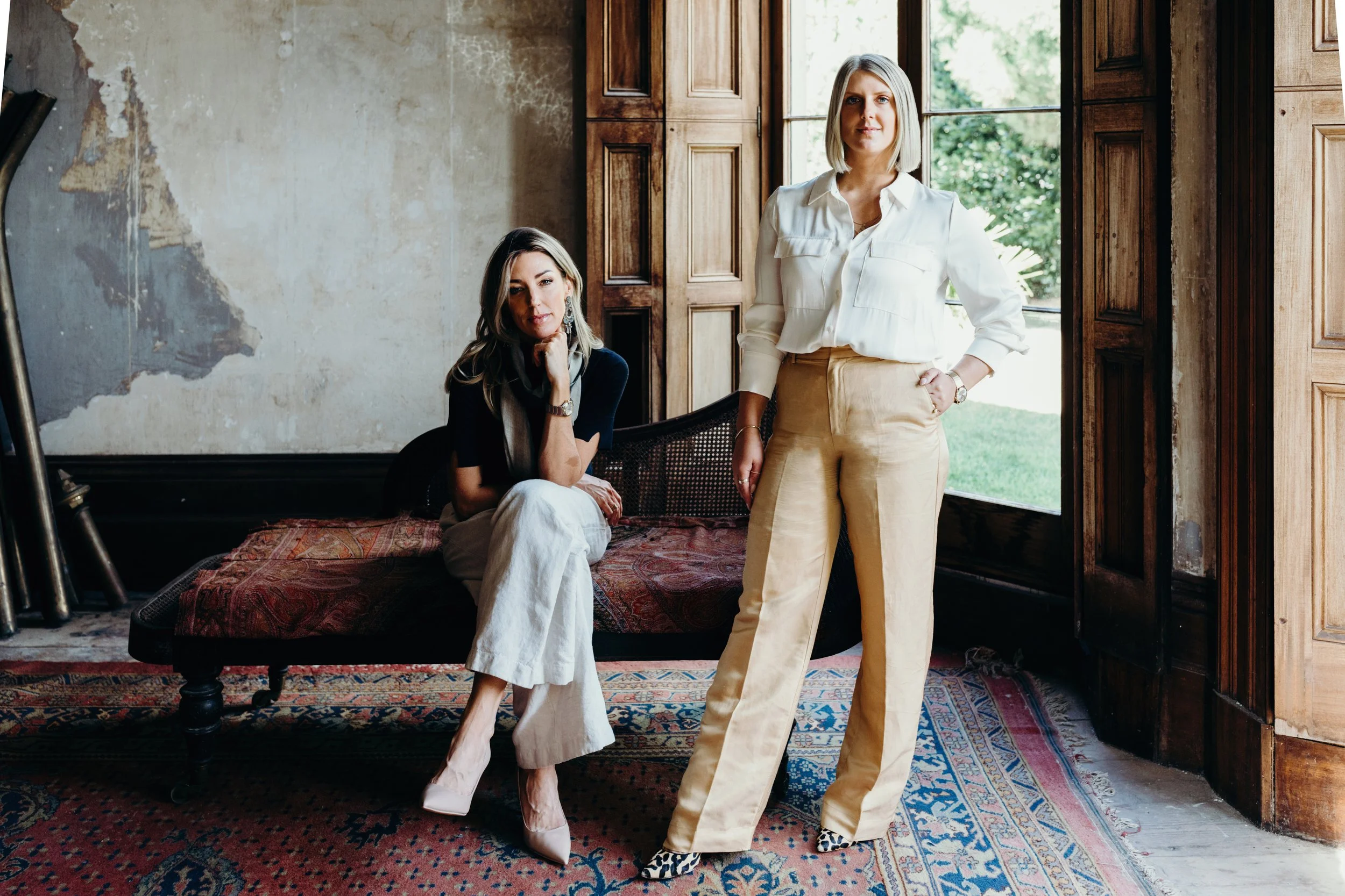 Two women pose for lifestyle professional photography in Tasmania.