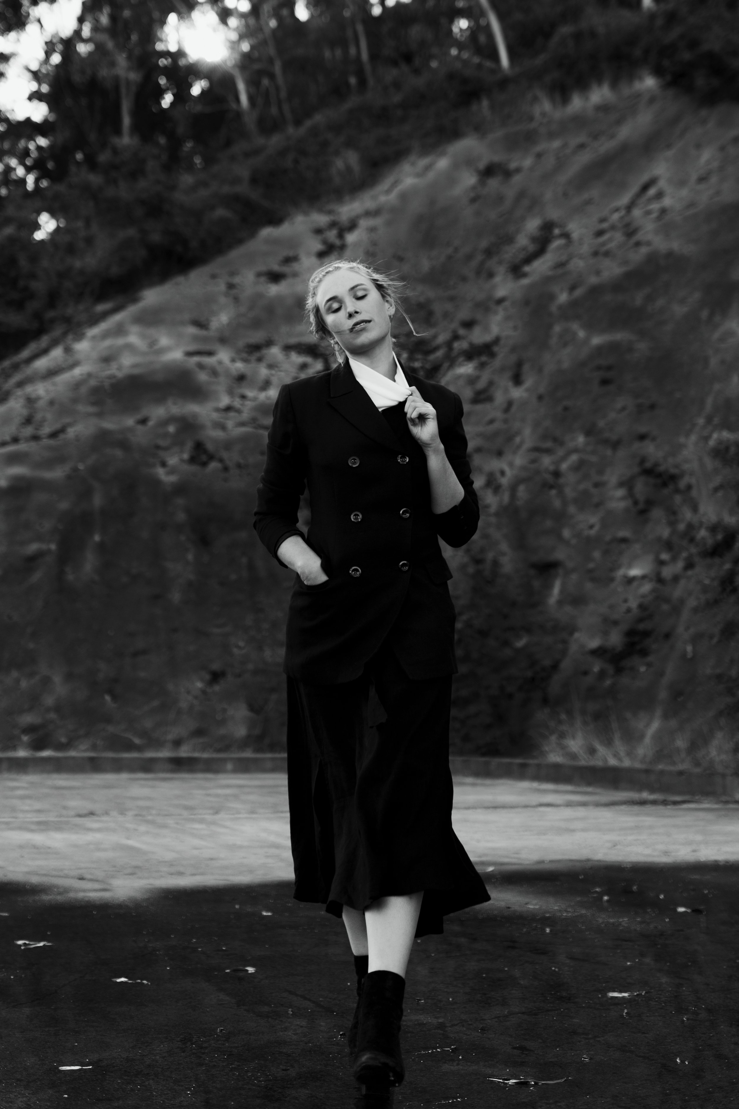 Model walks through puddles in South Hobart.