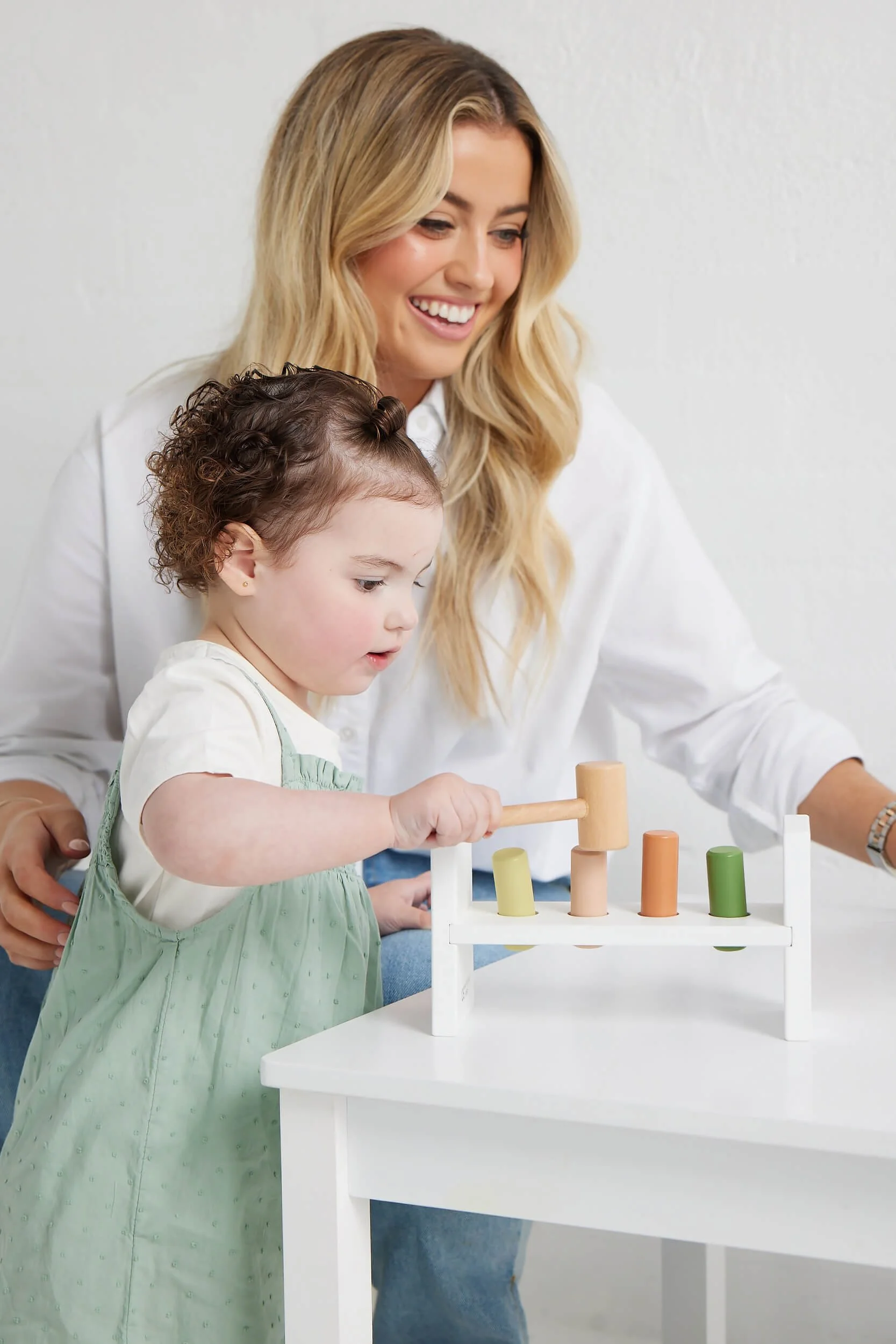 Sarah-Jane Stevens working with a child during a developmental therapy session at Assist Therapy in Adelaide