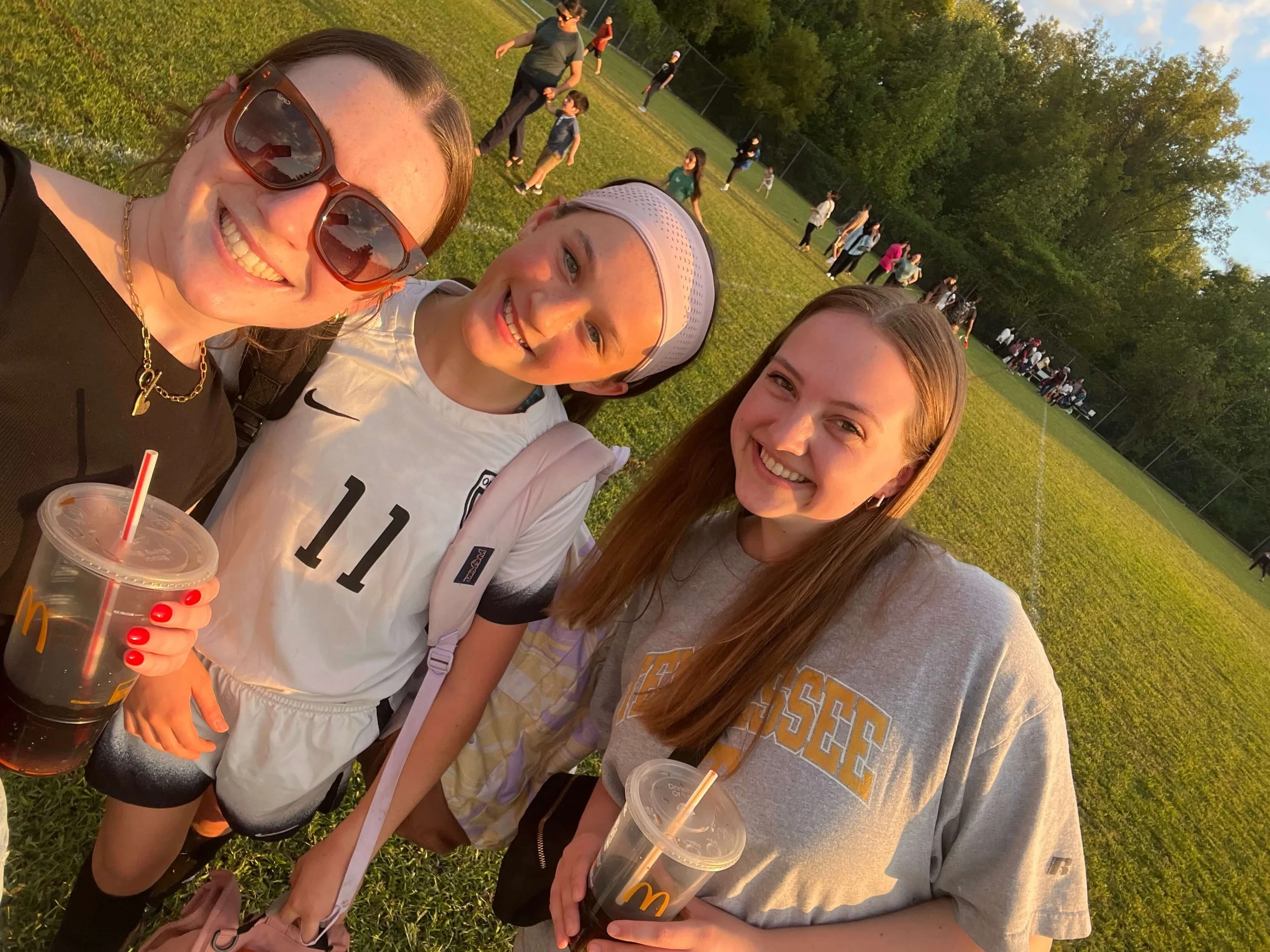 female youth leader and two students