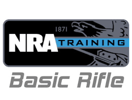NRA Basic Rifle Training logo featuring a black, gray, and blue design with a rifle silhouette.