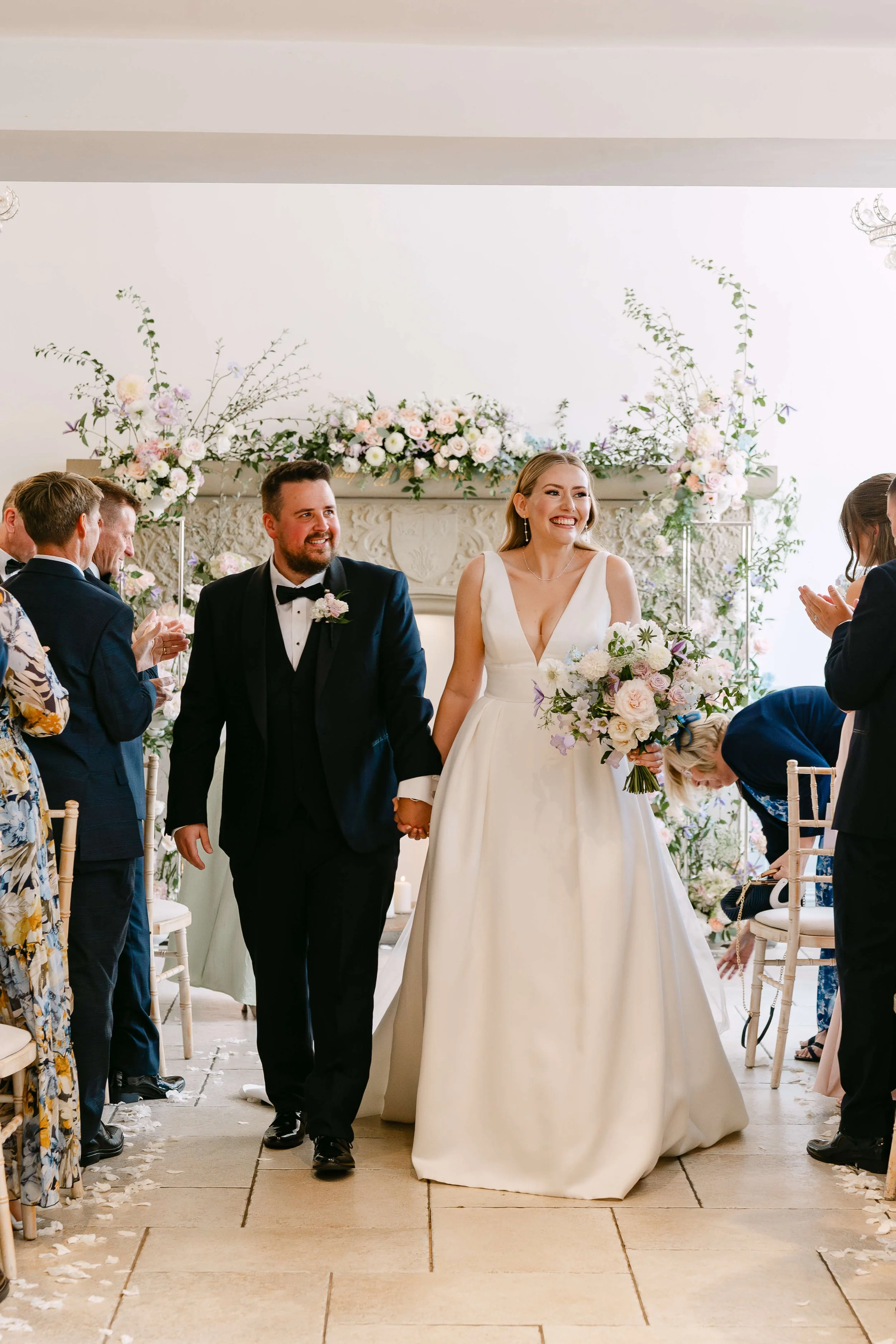 Just married with Butterfly Road flowers