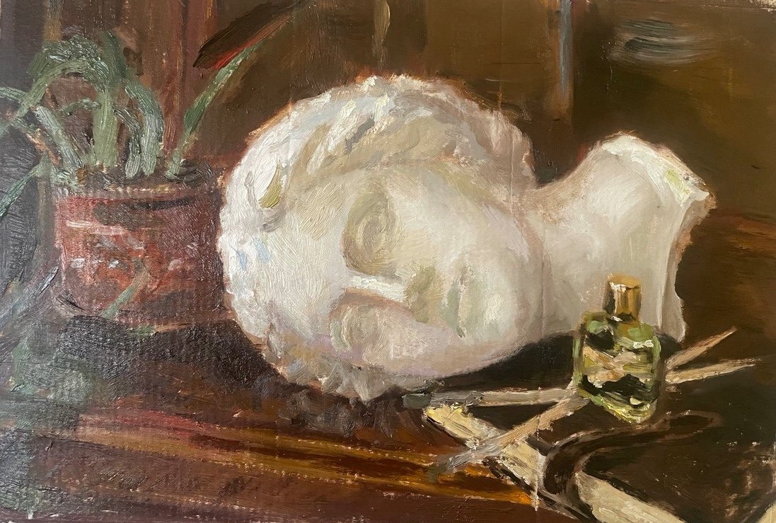 “A still life with a plaster head, surrounded by meaningful objects to me,” by Alina Khalitova, 2025, 50×70 cm, oil on canvas