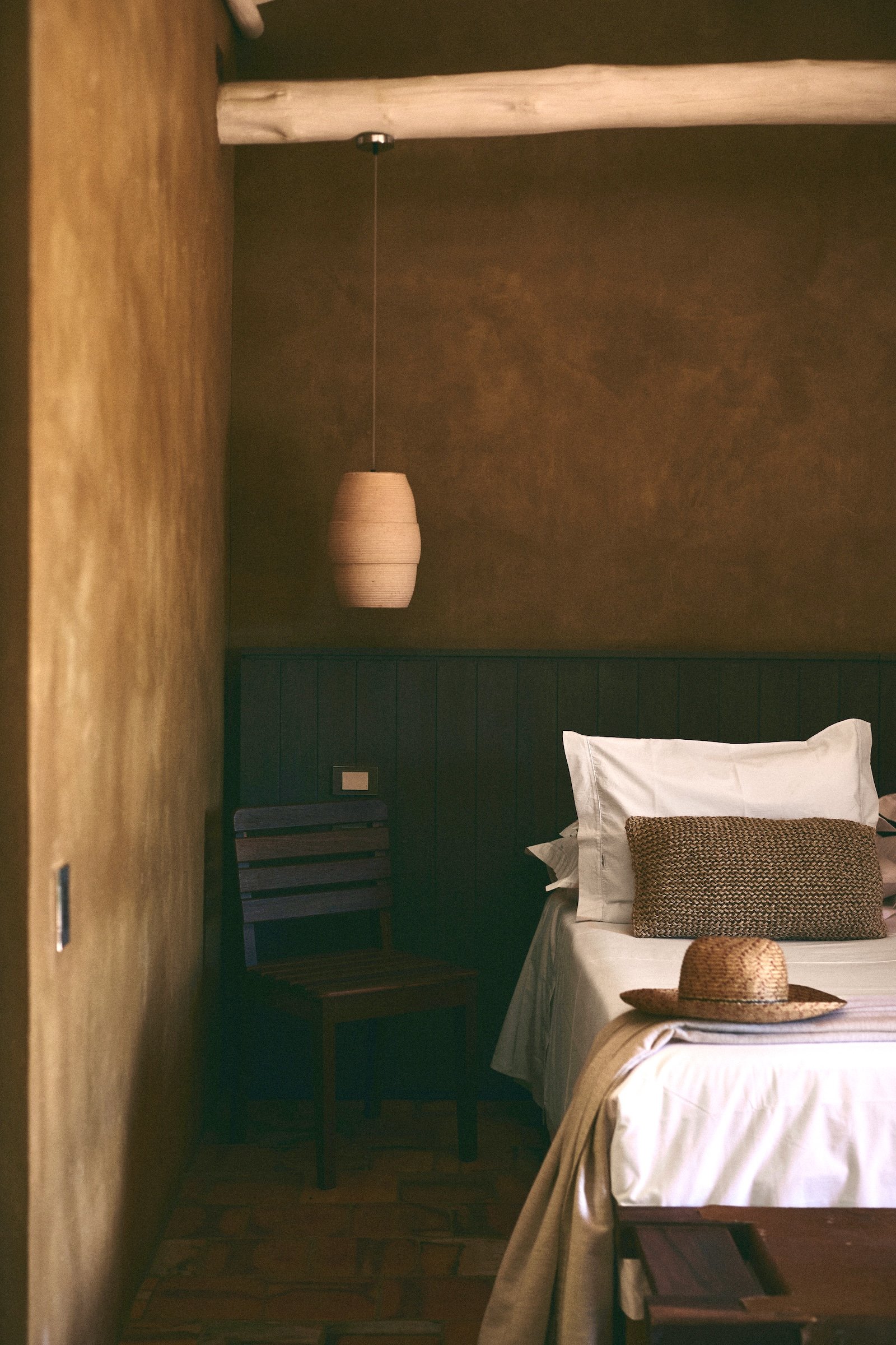 Suite room at Terrazul boutique hotel in Barichara, Colombia, featuring natural materials.