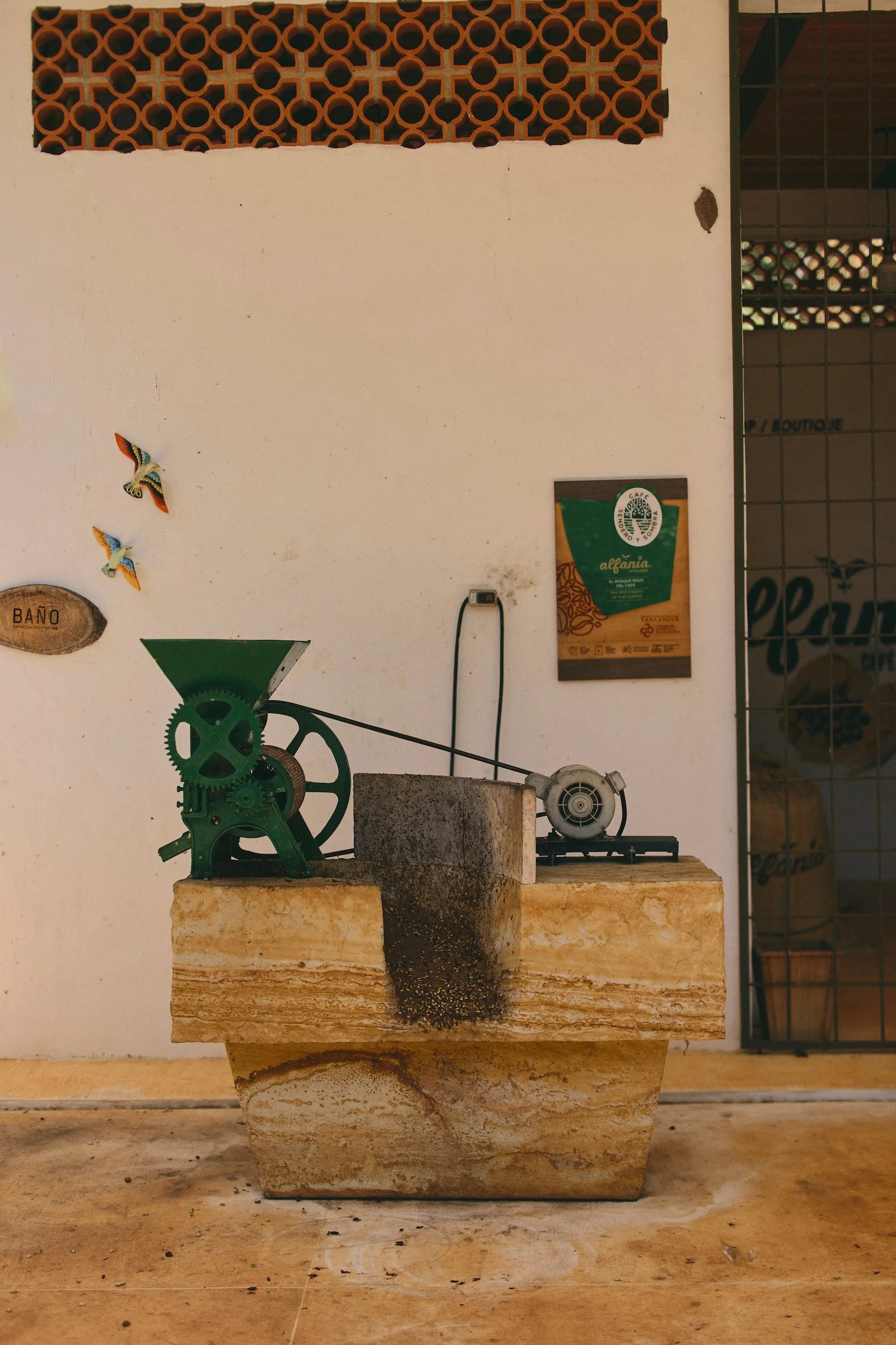 A traditional coffee-processing machine inside the production area at Alfania Coffee Farm near Barichara, Colombia.