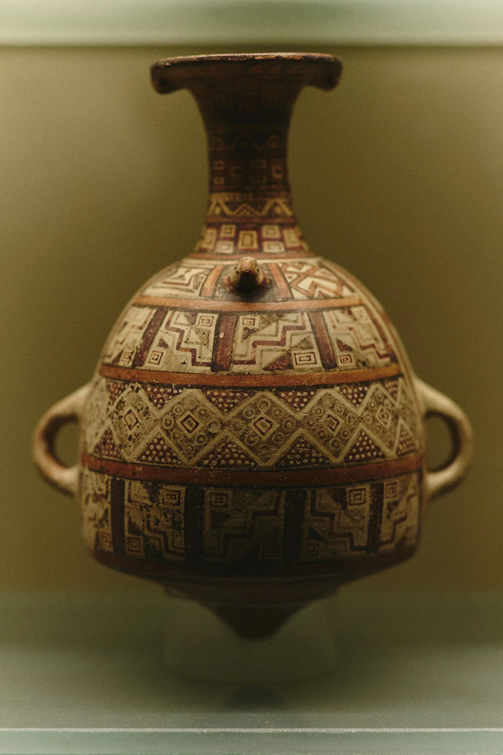 Decorated ceramic vessel inside the private gallery at Hacienda Huayoccari in Peru’s Sacred Valley, part of a luxury Peru experience by WhereNext Travel.