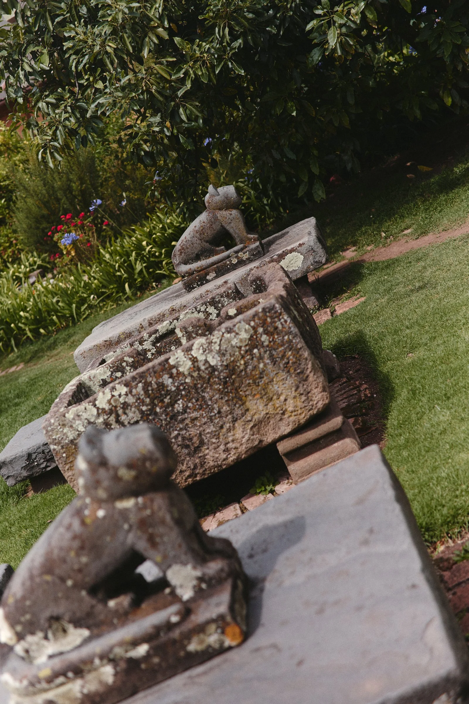 Garden artifacts at Hacienda Huayoccari in Peru’s Sacred Valley, a private hacienda experience designed by luxury Peru DMC WhereNext Travel.