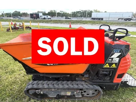 Used Cormidi C13.85 concrete dumper on lawn