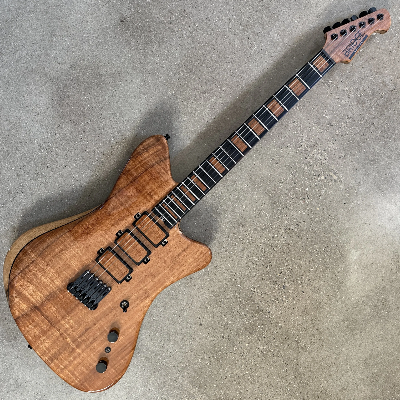 One piece figured KOA top Jazzbuilder