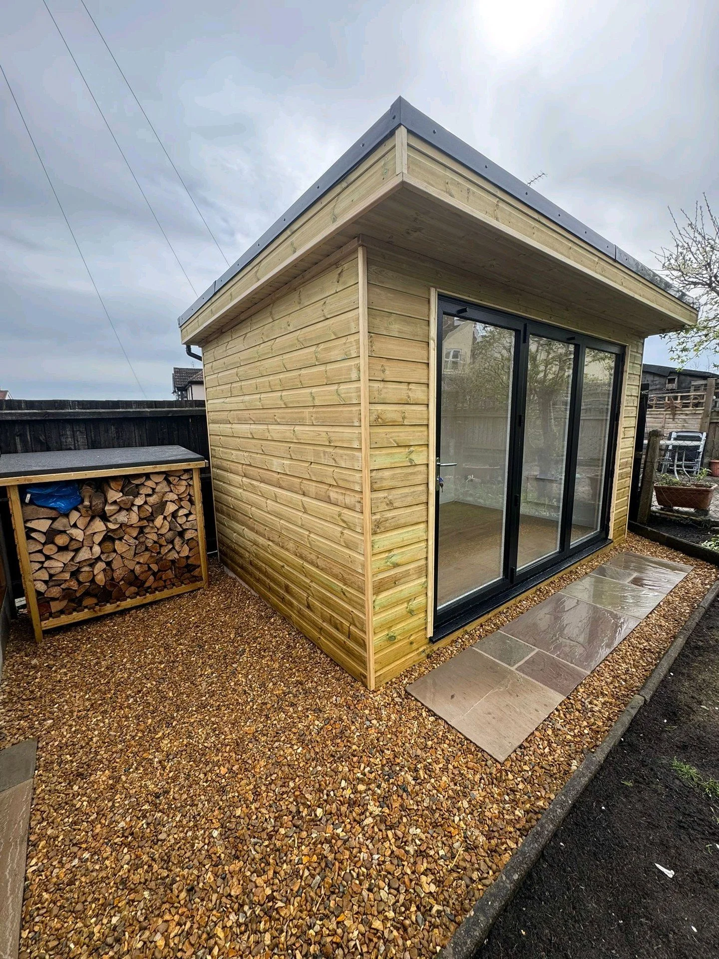 The landscaping team wrapped up this insulated 2.5m x 4m Garden room for a great client in Hinckley. 

It features a rubber roof + guttering, electrics + wall panel heater, laminate flooring, a 3m sliding aluminium door and is insulated + a plastered
