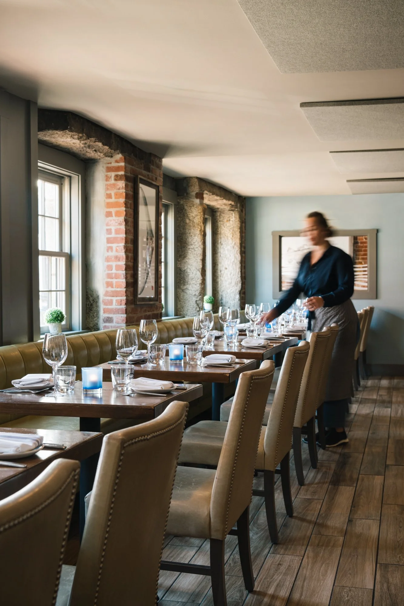woman-sets-restaurant-table-gloucester.jpg