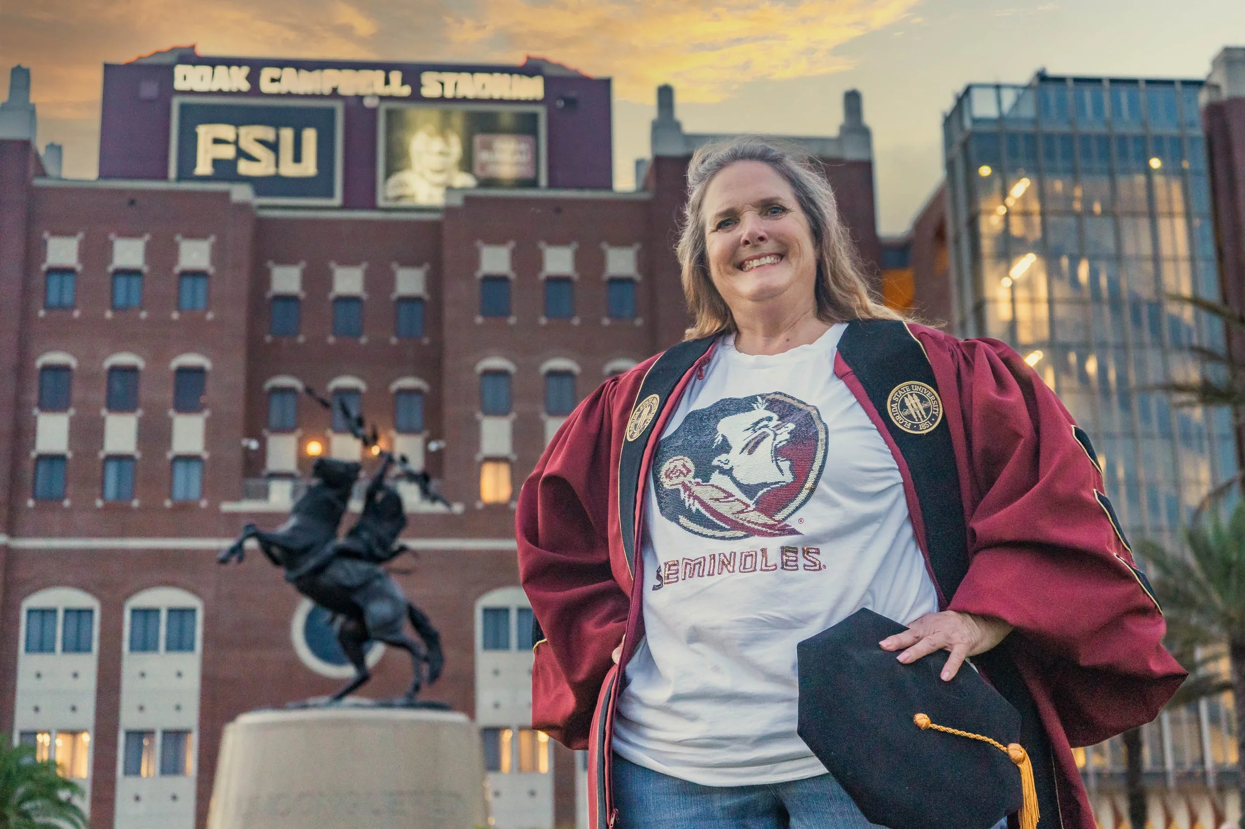 FSU graduation photography in front of Doak Campbell Stadium in Tallahassee
