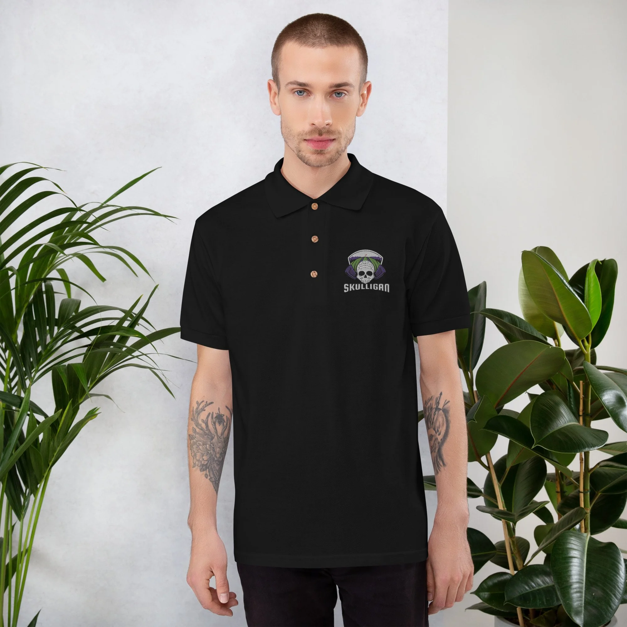 classic-polo-shirt-black-front-631f4f43f1acc.jpg