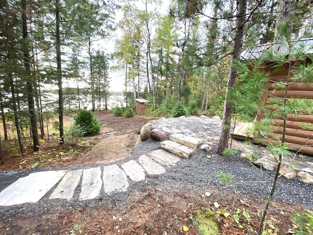 Landscape stone path to lake in Ely, MN.