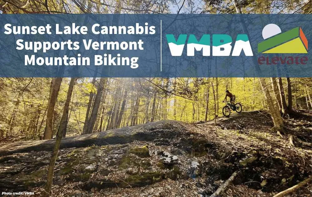 Photo of a person on a mountain bike trail in Vermont. Text says "Sunset Lake Cannabis Supports Vermont Mountain Biking." VMBA and Elevate logos.