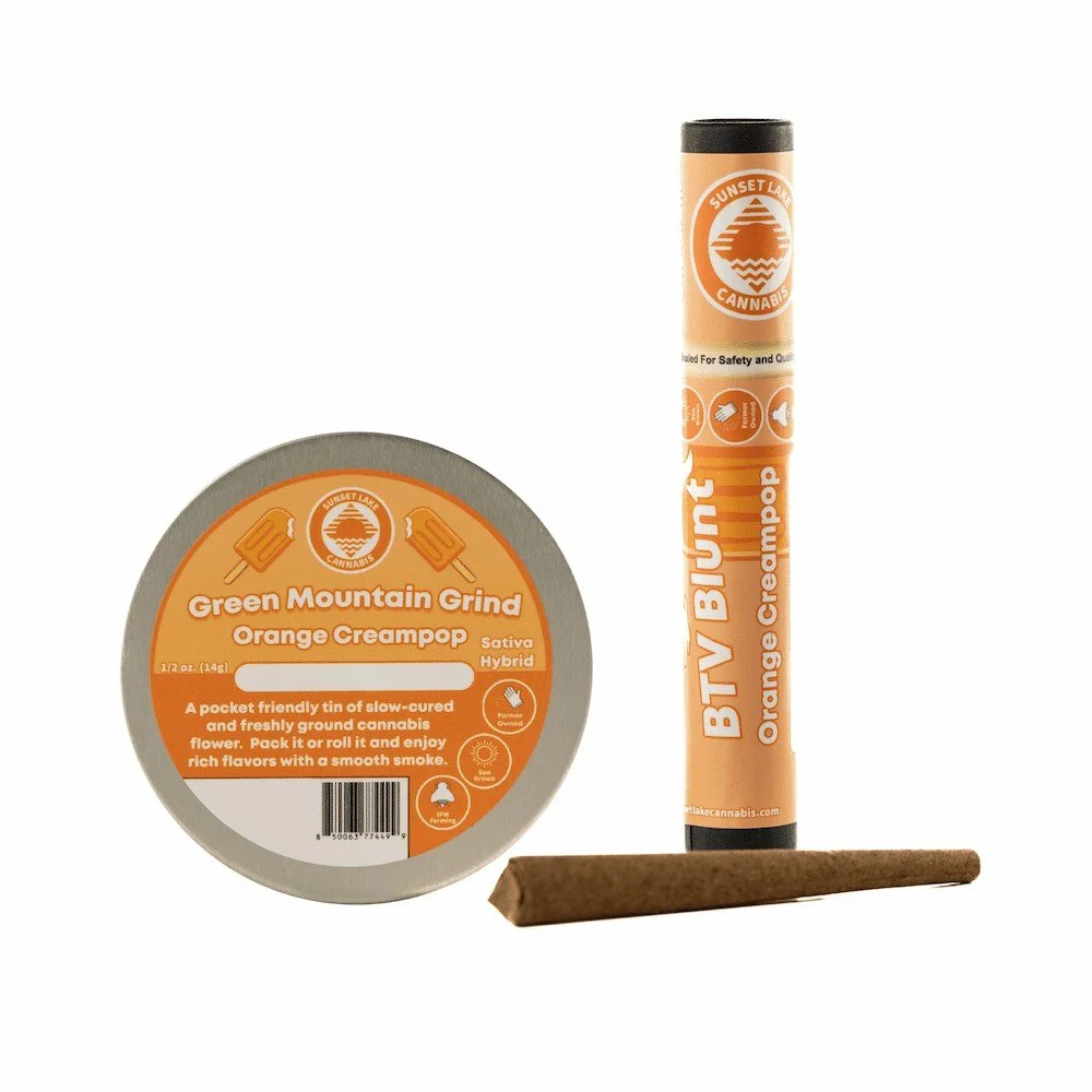 Green Mountain Grind tin of Orange Creampop and a BTV Blunt by Sunset Lake Cannabis in Vermont.