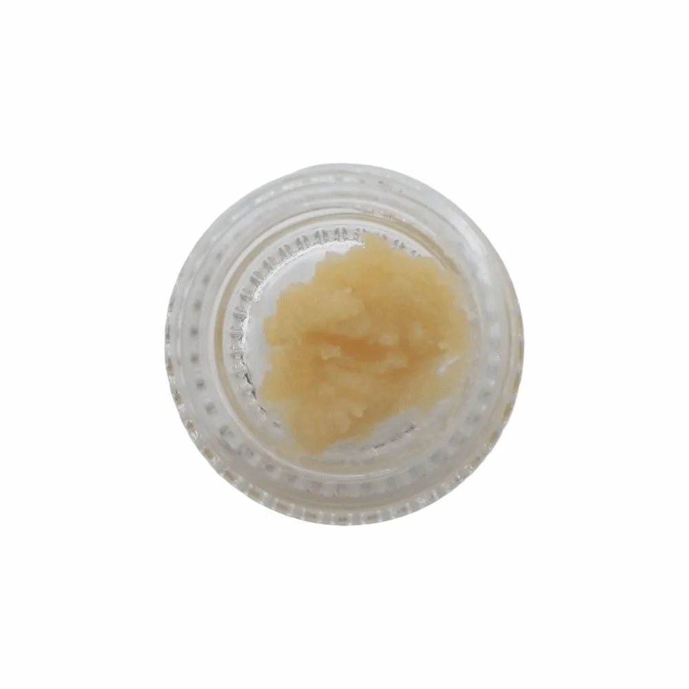 Photo of an open jar of fresh frozen live hash rosin by Sunset Lake Cannabis in Vermont.