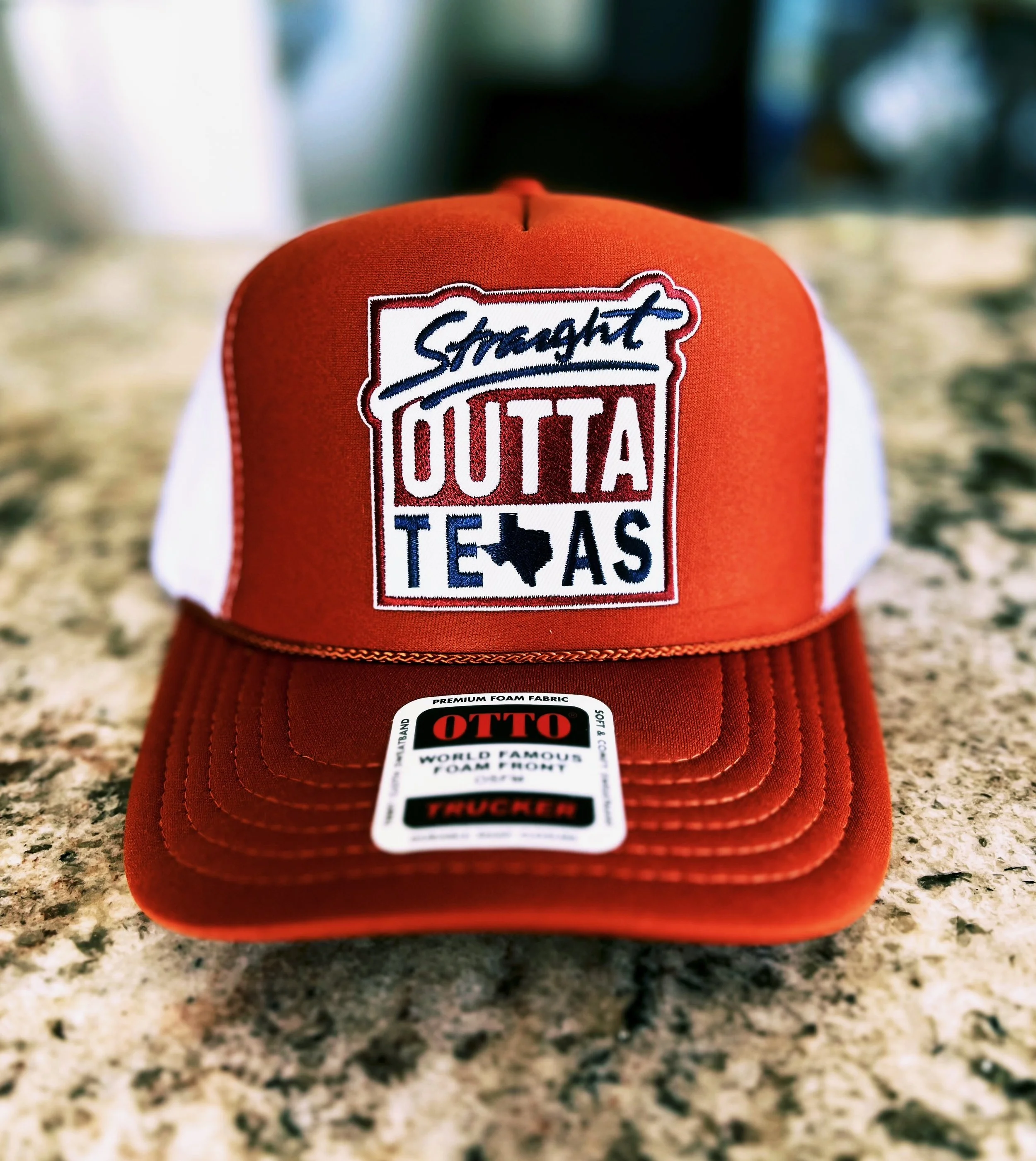 Straight Outta Texas Trucker Hat in Texas orange on a foam from Otto hat by The Bitter Bitch Co