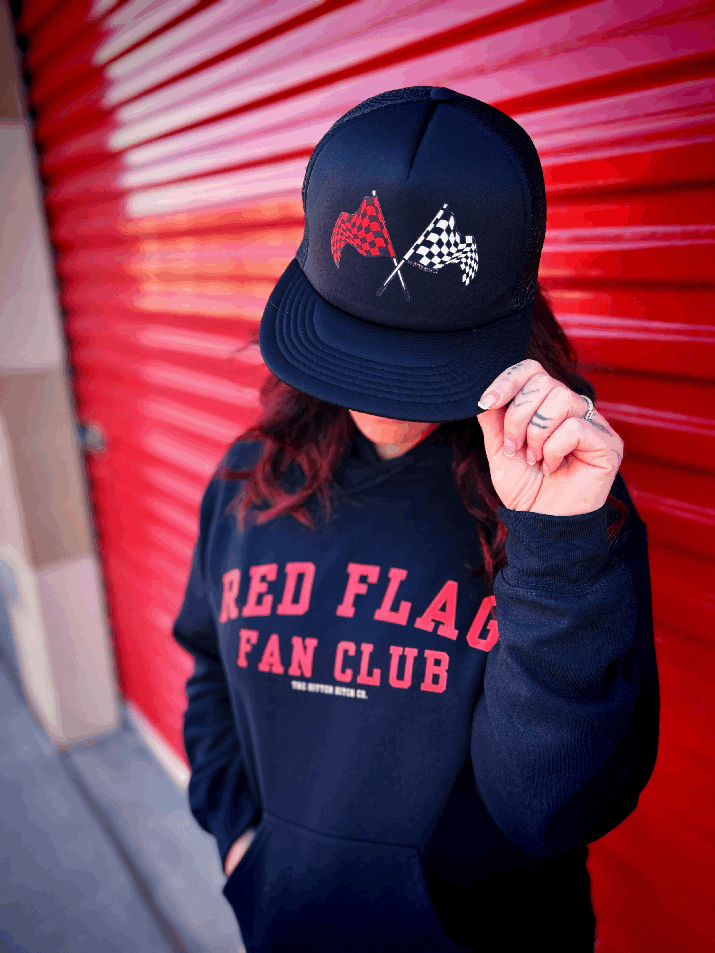 Red Flag Fan Club trucker hat by The Bitter Bitch Co
