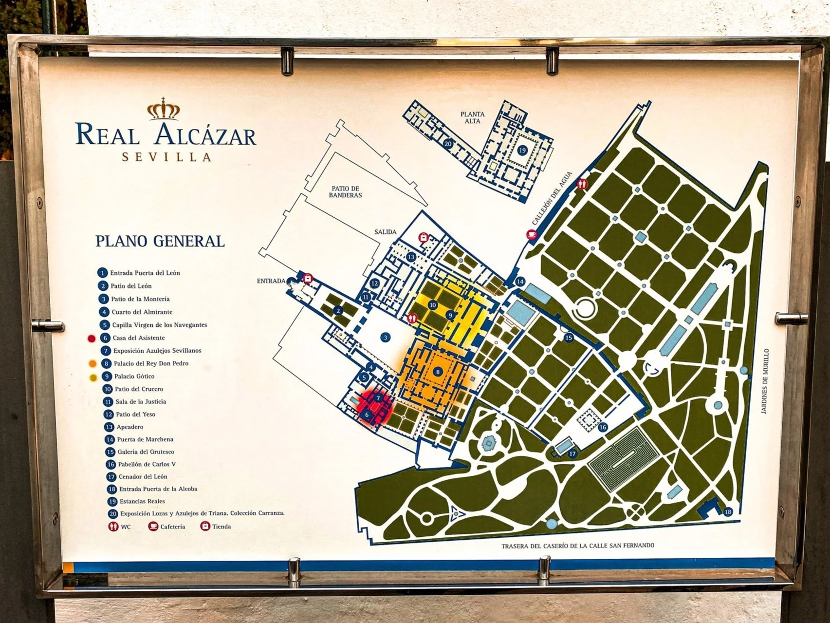 Map of the Royal Alcázar of Seville showing various sections, gardens, and points of interest with a legend and labels.
