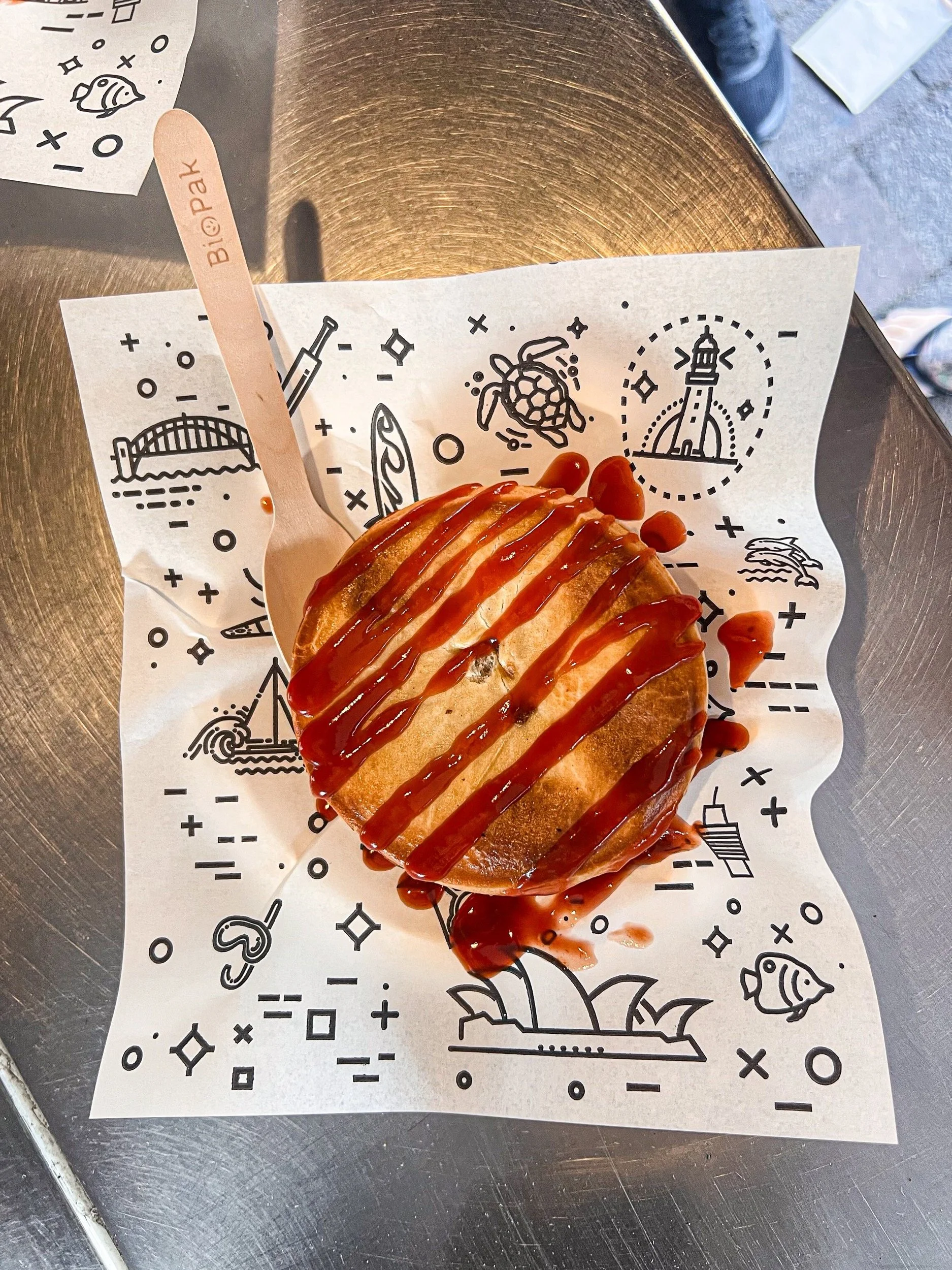 A meat pie with sauce in the heart of Sydney at Harry's Cafe de Wheels