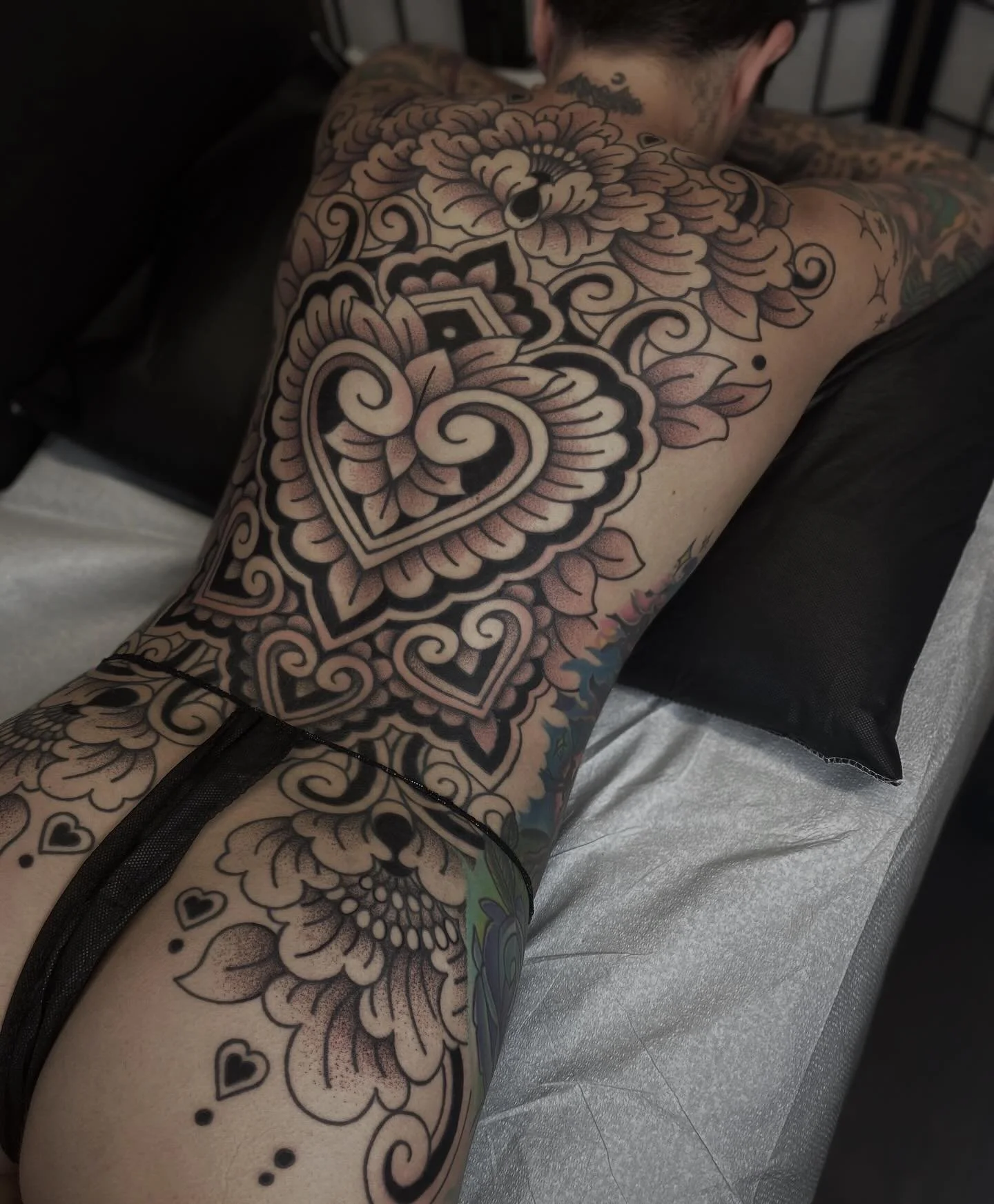 Finished this love themed backpiece for Stacy 💕 Lines are healed from last summer, swipe to see when they were fresh!
&bull;
#ornamentaltattoo #backpiecetattoo #backtattoo #lineworktattoos #denvercolorado