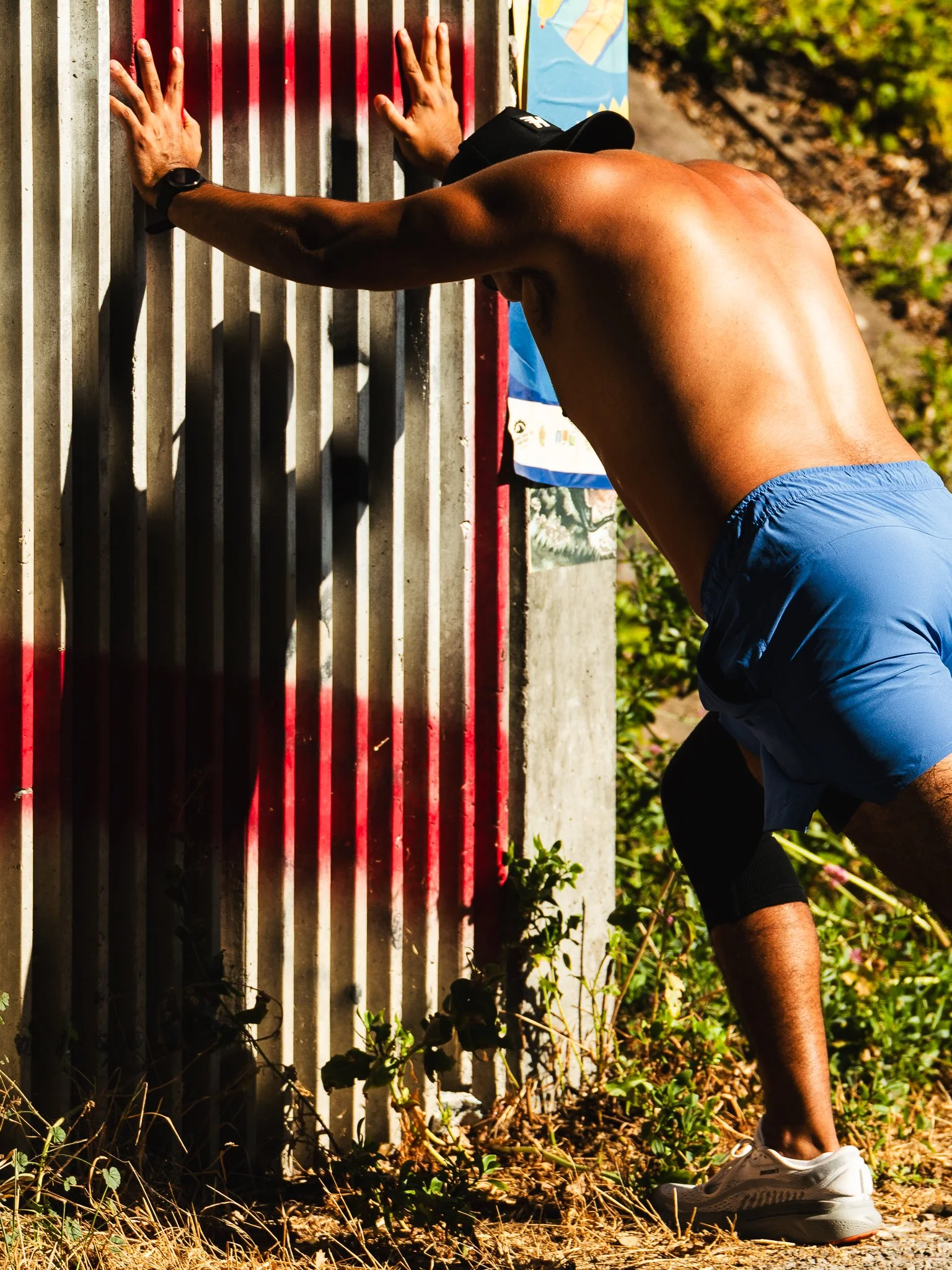 Male runner stretching — Chicago running photographer sports photography