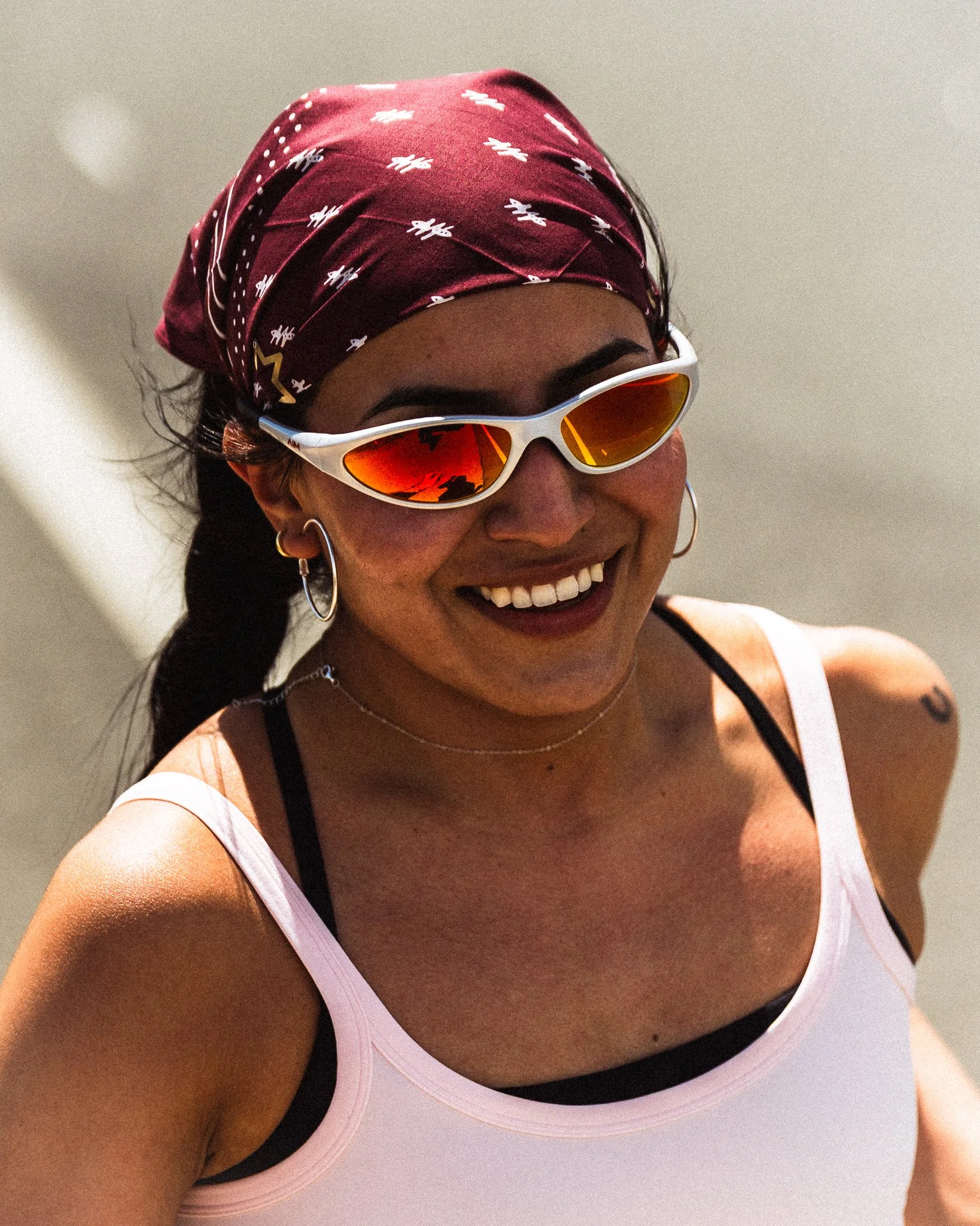 Female athlete portrait wearing always in motion glasses — Chicago sports photographer The Speed Project brand photographer