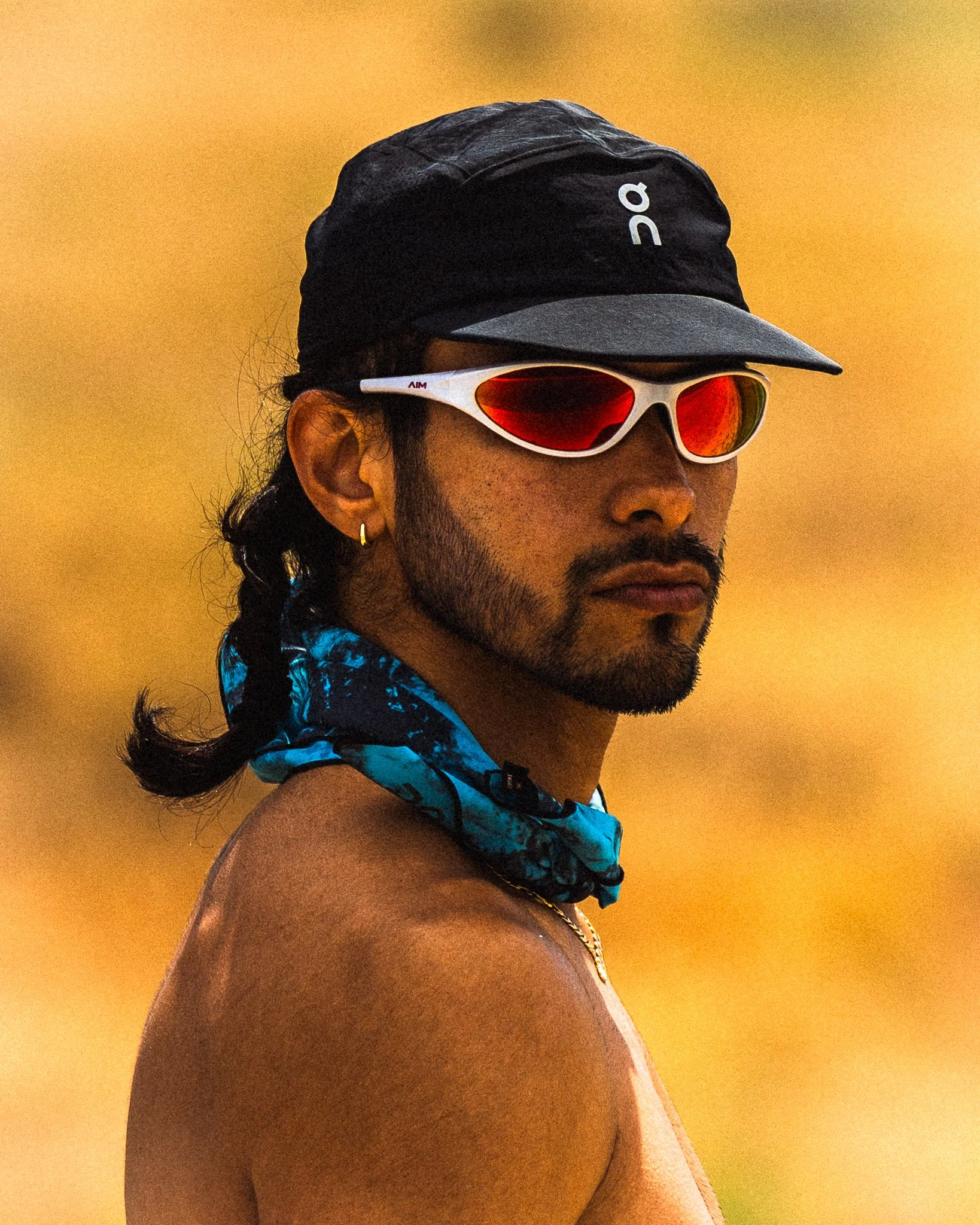 Male athlete portrait wearing On Running hat  — Chicago sports photographer The Speed Project running photography