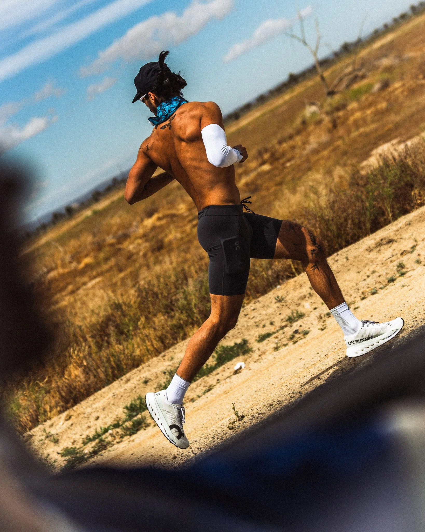 Male athlete mid-stride - Chicago Brand Photographer Running Photographer The Speed Project