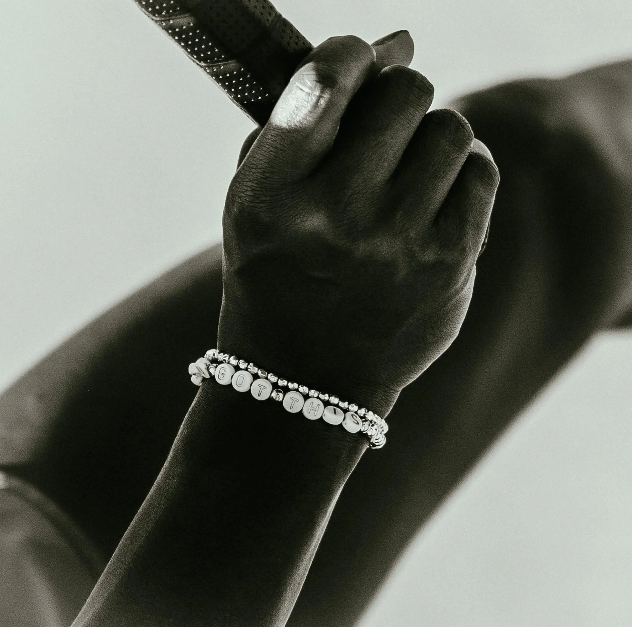 Hands on Wilson tennis racket — athletic brand photography Chicago