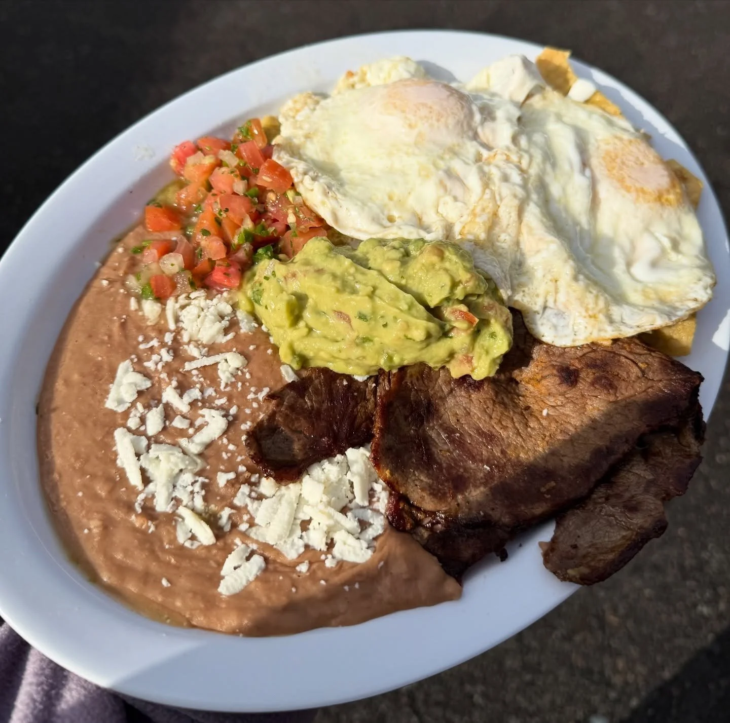 Feliz lunes! Can&rsquo;t decide? Chilaquiles are always the answer. Red or green sauce, steak or eggs 🍳✨

Available all day at both locations 

#chilaquiles #pdx #pdxfood #travelportland #eatportland