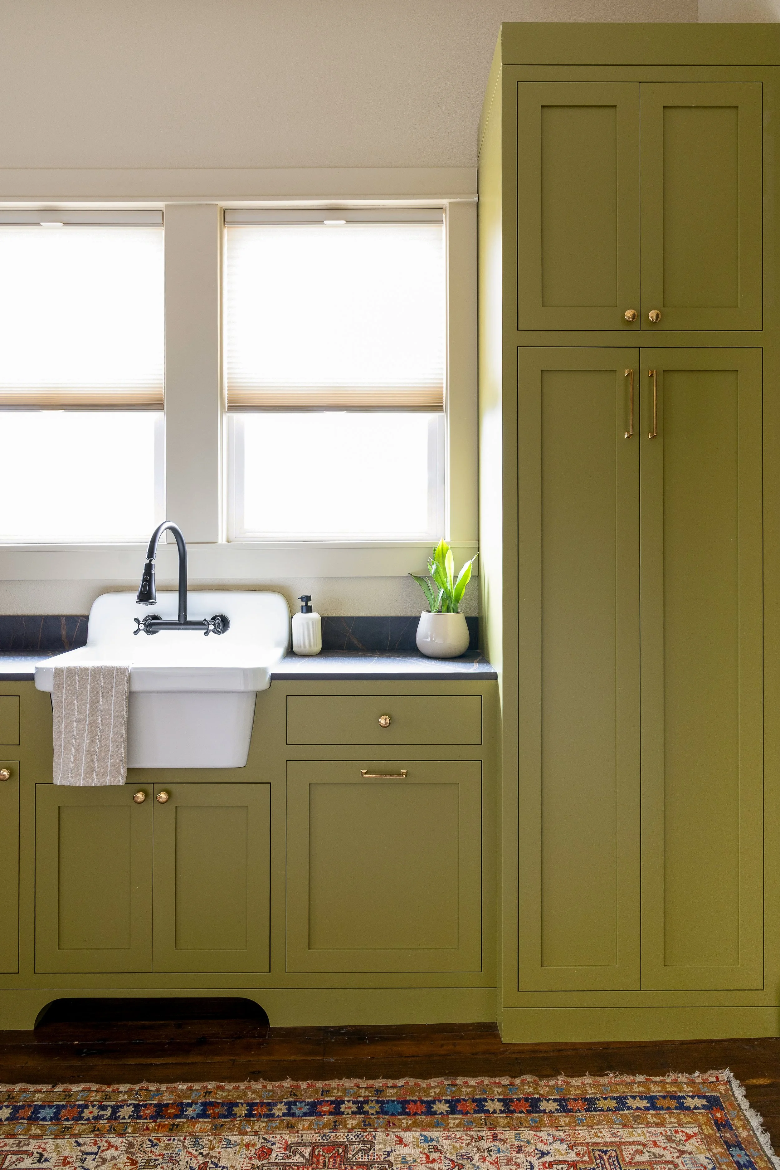 A bright and cheery mudroom with functional storage