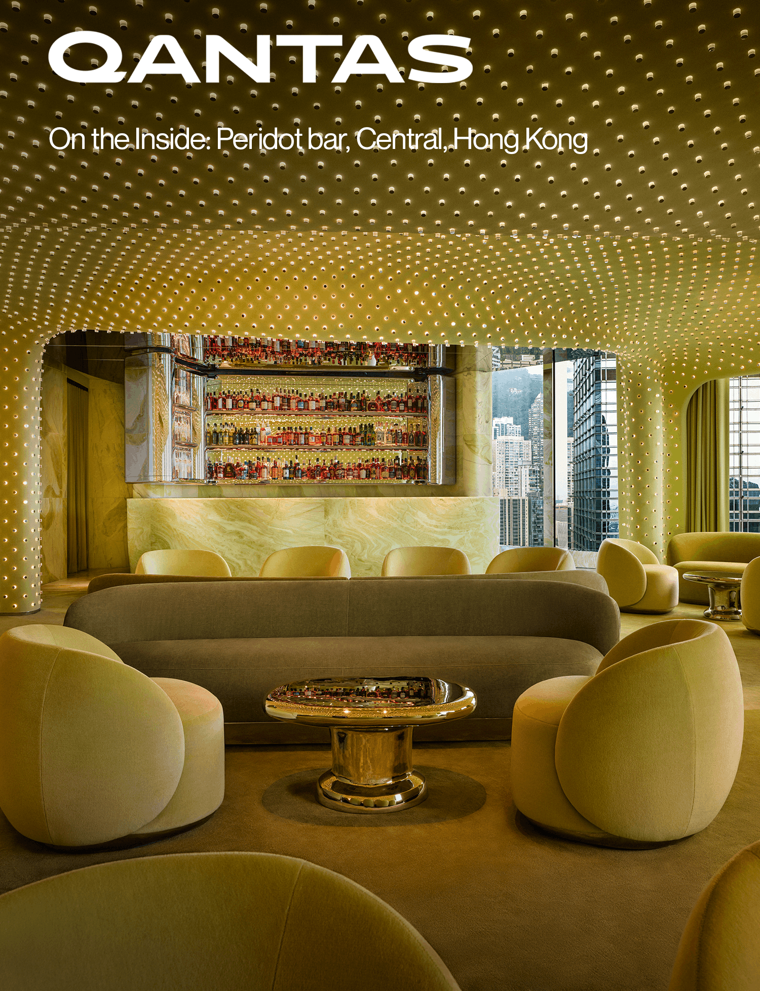 Curved seating beneath a glowing perforated ceiling inside Peridot bar.