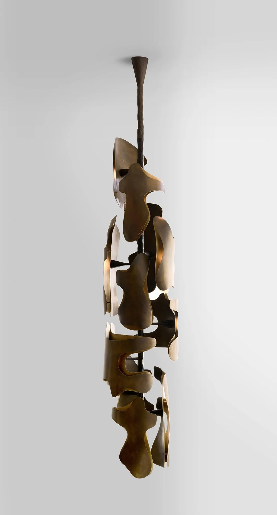 Studio view of Okia pendant against white background
