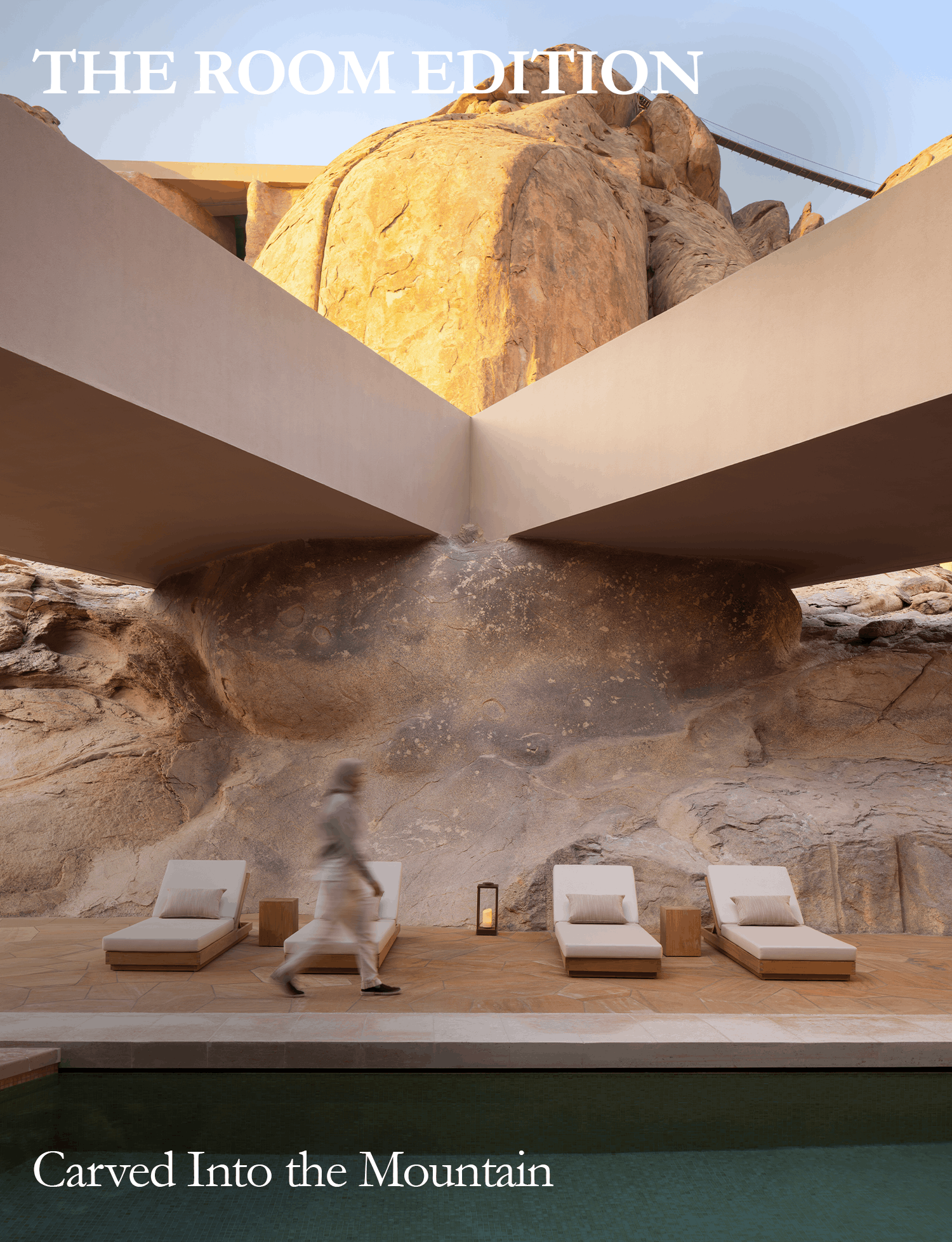 Desert Rock resort architecture built into a rocky landscape beside a pool.