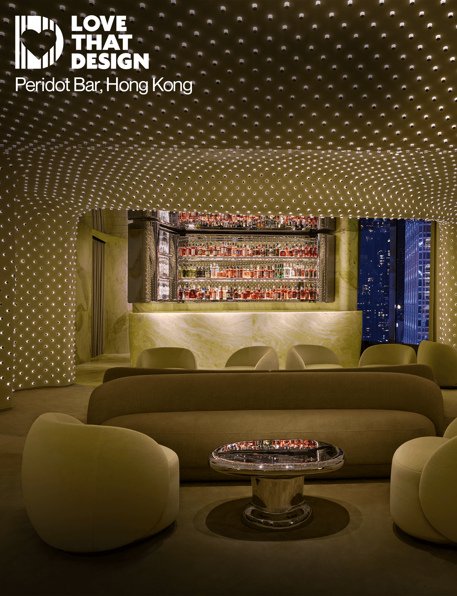 Peridot lounge with curved seating and a perforated gold ceiling.