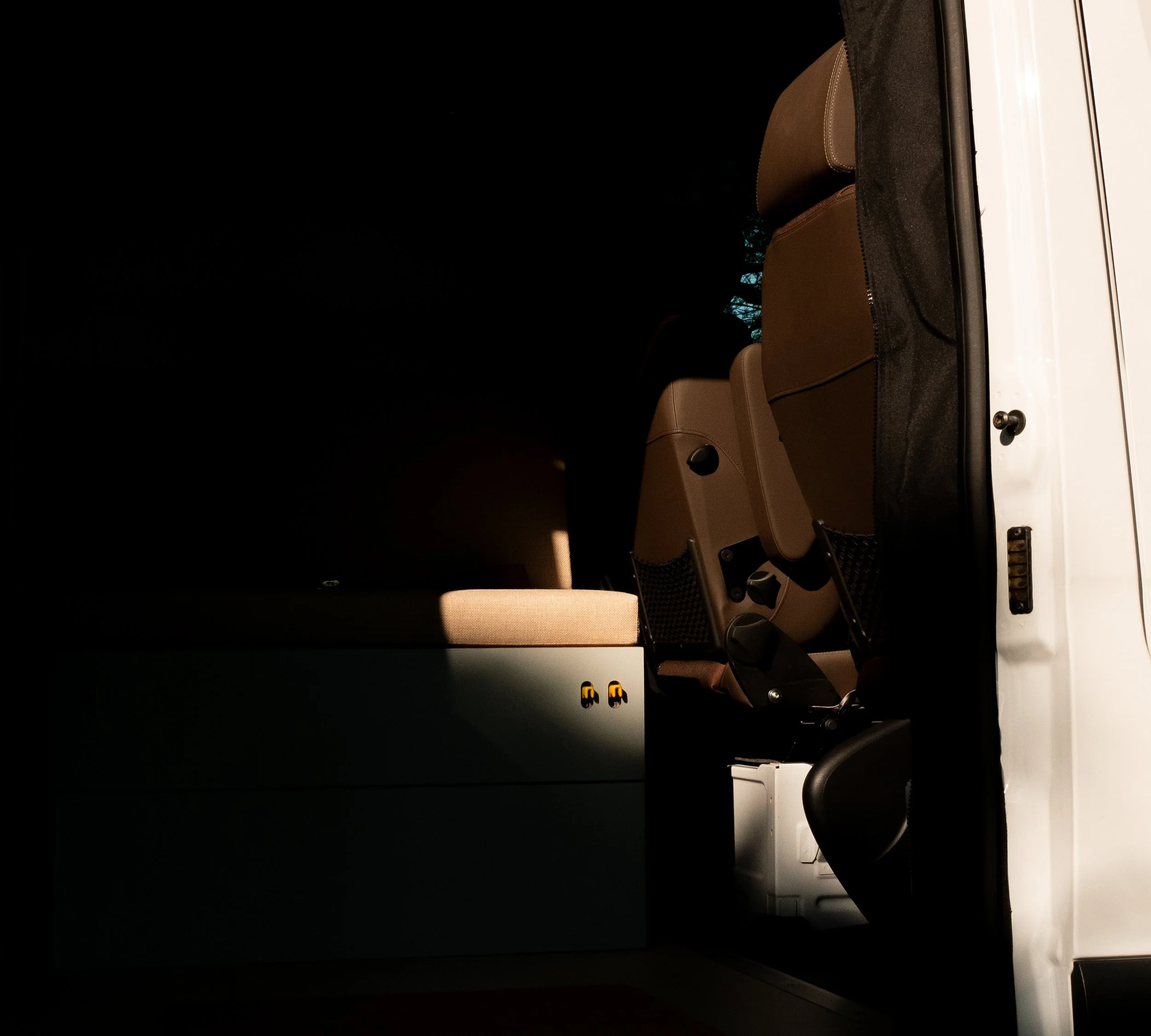 Moody sunset interior detail of 'Aina' — Roamer Vans custom Sprinter conversion