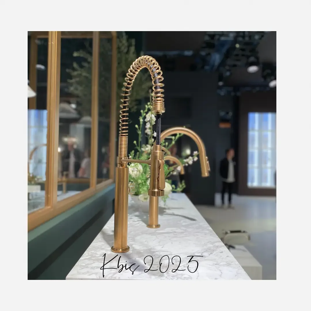 A gold faucet elegantly positioned on a countertop, showcasing its sleek design and luxurious finish