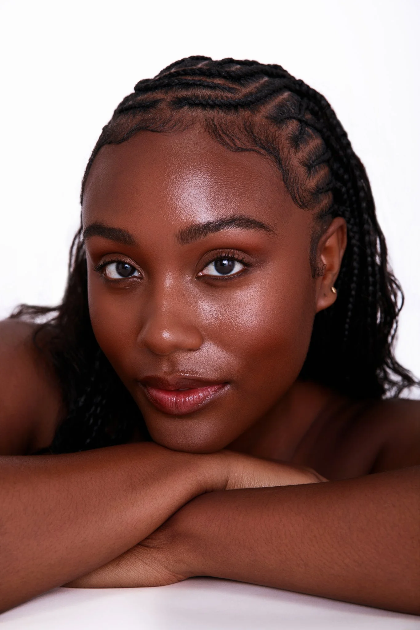 shot by Cass Michael. makeup by Sparkle Tafao. hair by @_.braidsbycc.